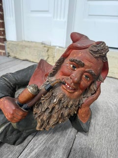Antique Terra Cotta Gnome Lying Down and Smoking a Pipe