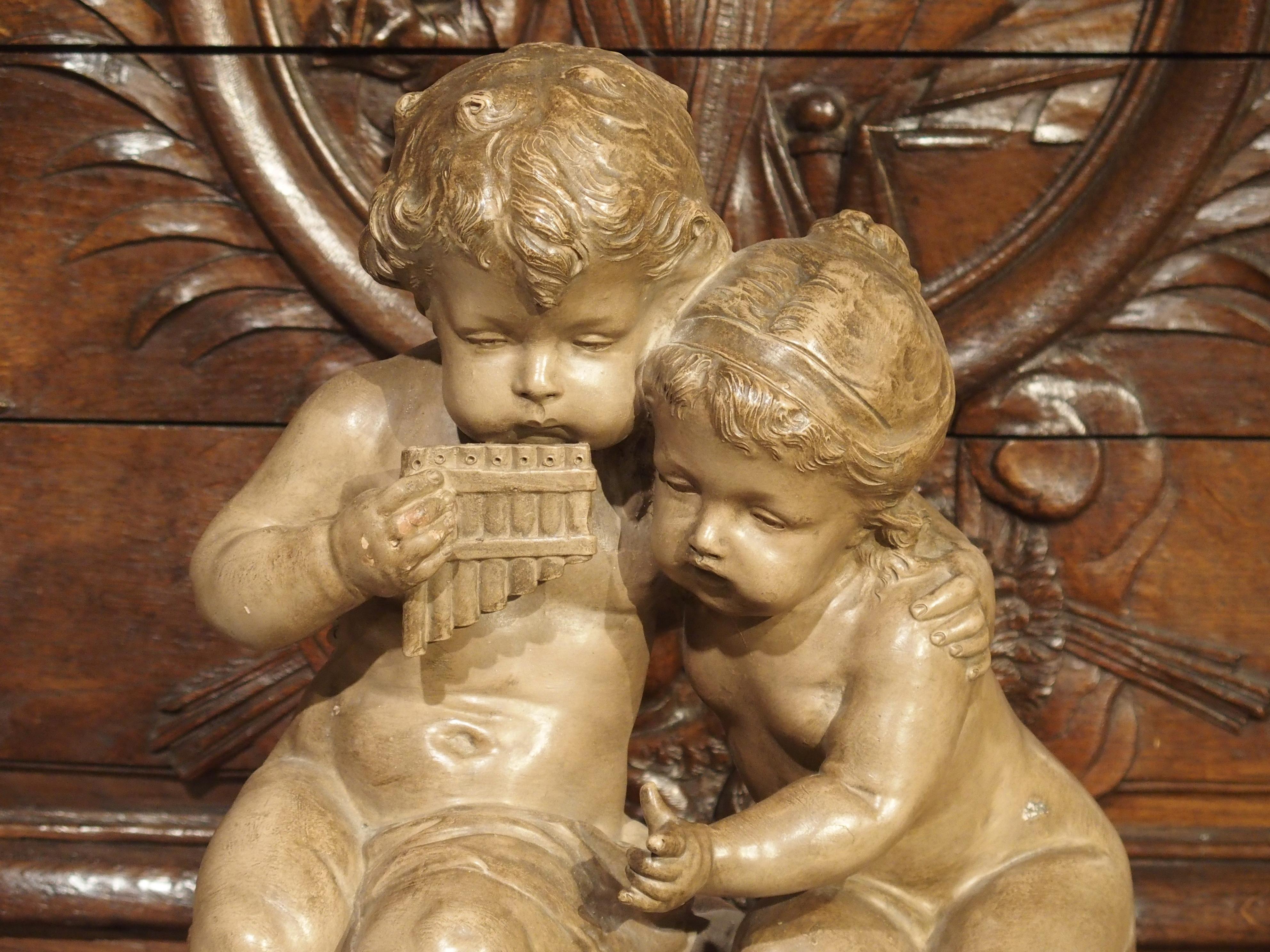 French Antique Terracotta of a Boy and Girl, France, Early 1900s