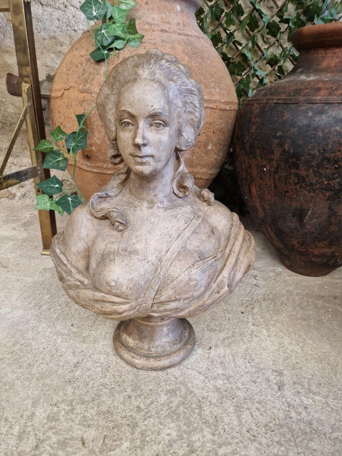 

This antique terracotta bust depicts the French queen Marie Antoinette, showcasing a historical period of 1850-1900. The bust is handmade and signed, measuring 48 cm in length, 62 cm in height, and 24 cm in width. The sculpture is a single piece