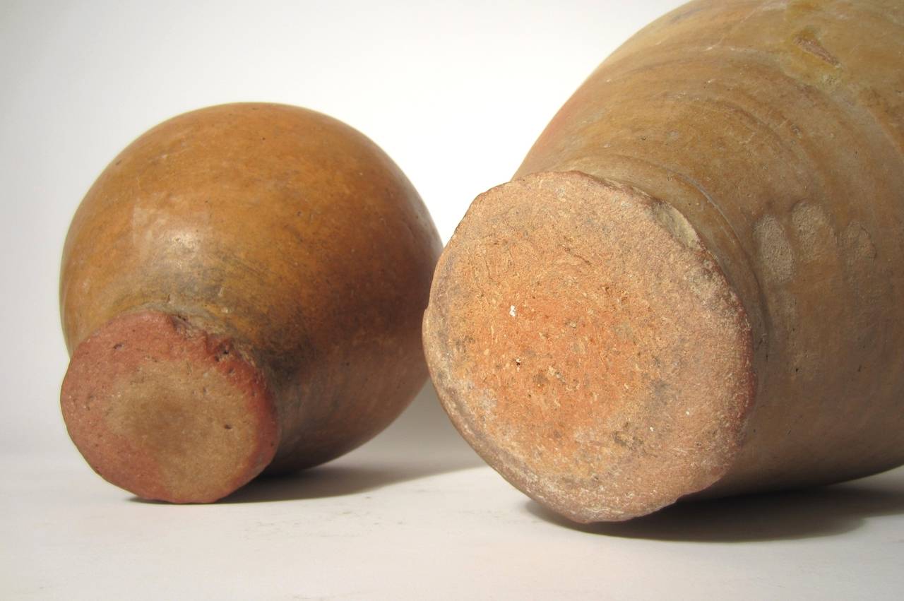Argilla Antichi barattoli per olio con manico in terracotta in vendita