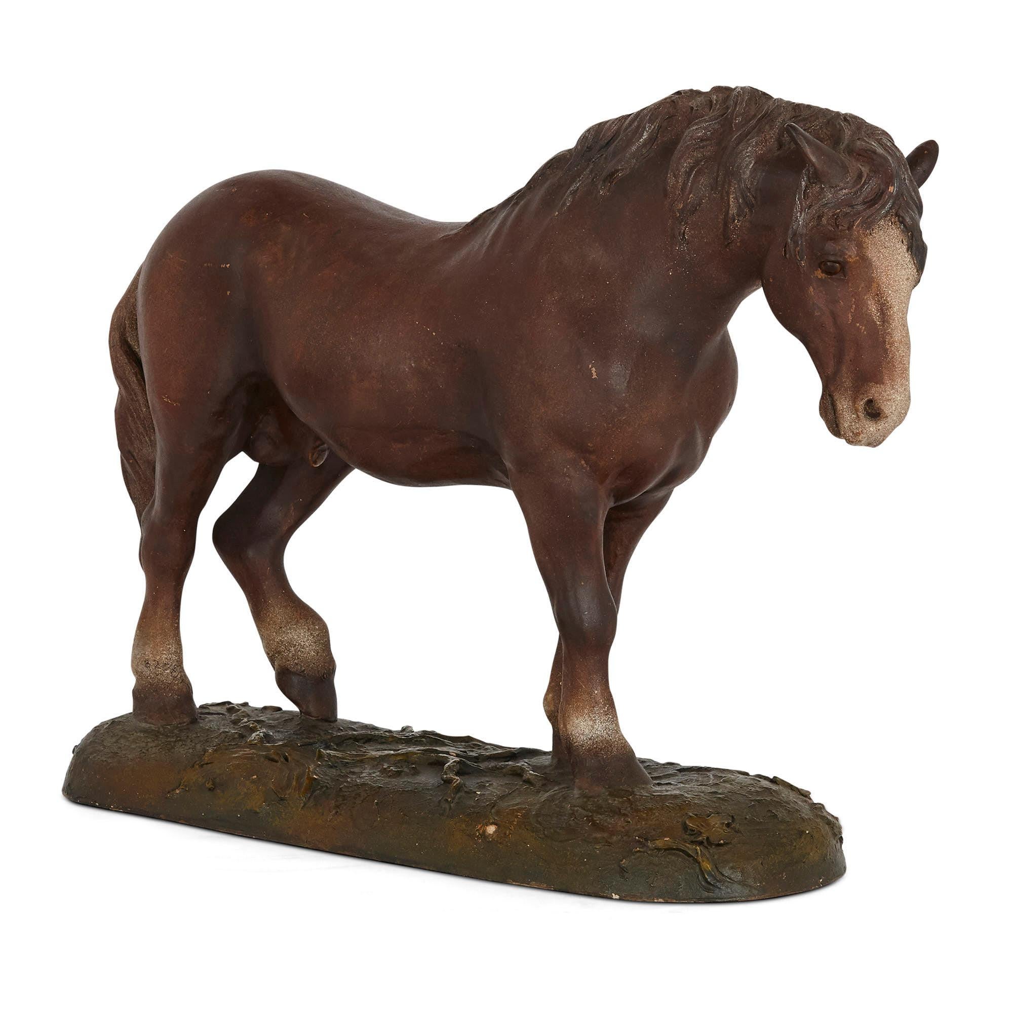 Antique terracotta equestrian model of a horse
Continental, early 20th century
Dimensions: Height 37cm, width 46cm, depth 17cm

This naturalistically rendered horse sculpture is crafted from painted terracotta in the early 1900s. It depicts an