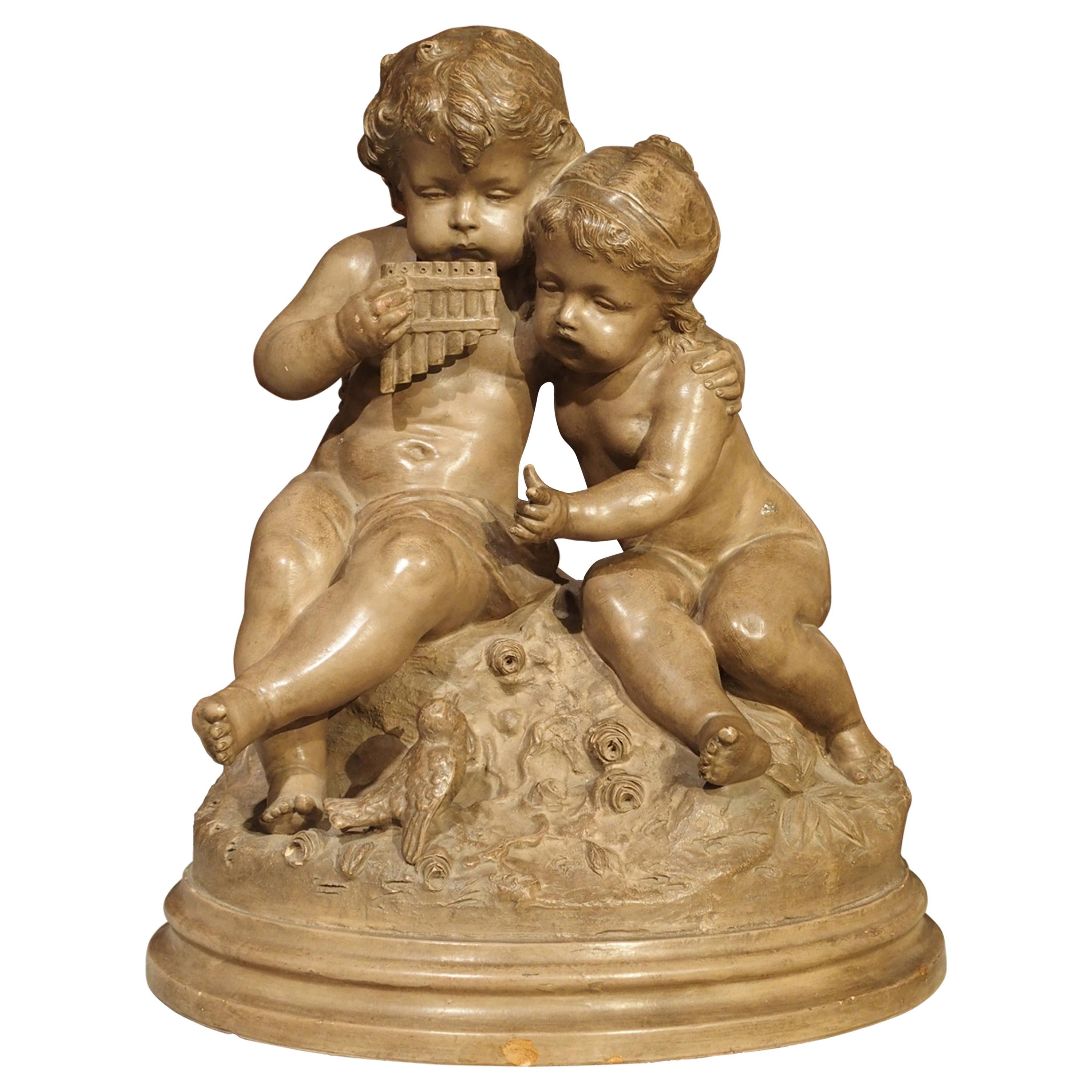 Antique Terracotta of a Boy and Girl, France, Early 1900s