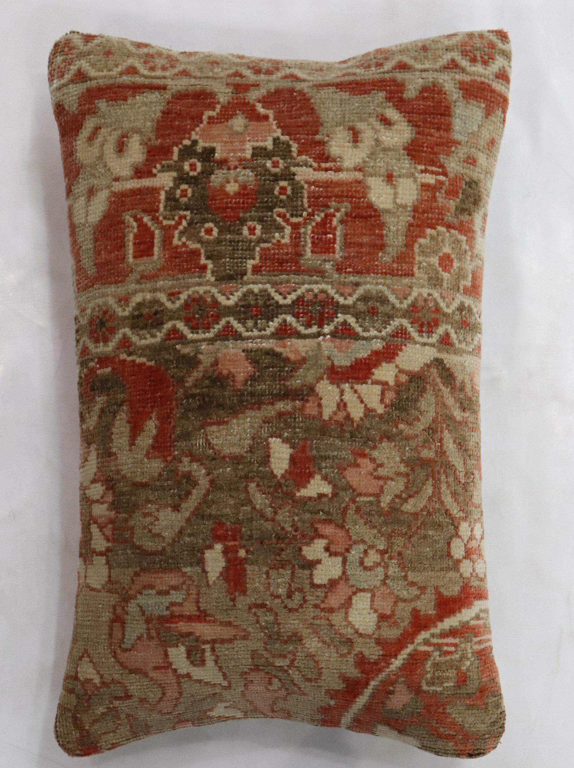 Pillow made from an antique persian Tabriz rug with poly fill and zipper closure provided.

Measures: 16'' x 24''.