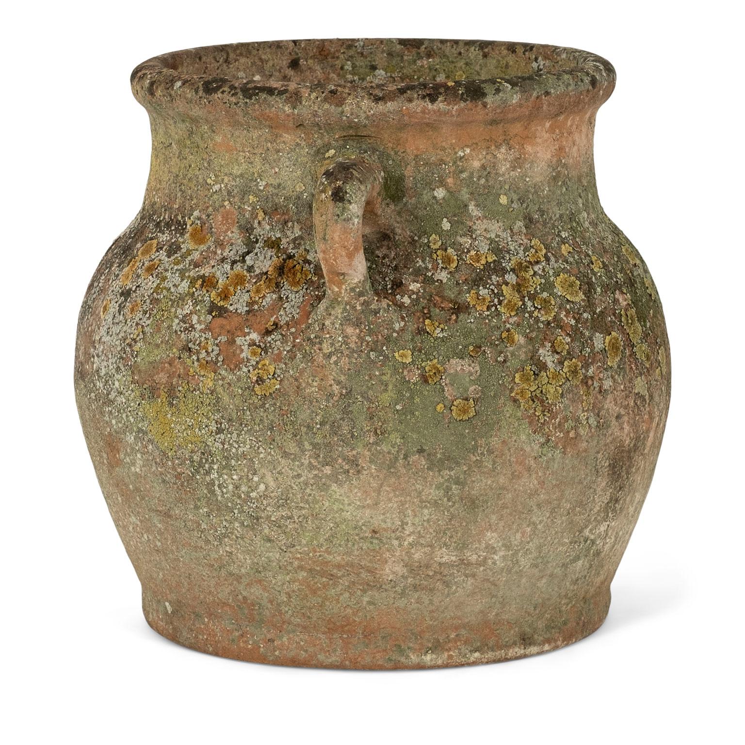 Antique terracotta pot with handles. Three available (see last image). Sold individually and priced $1,200 each.