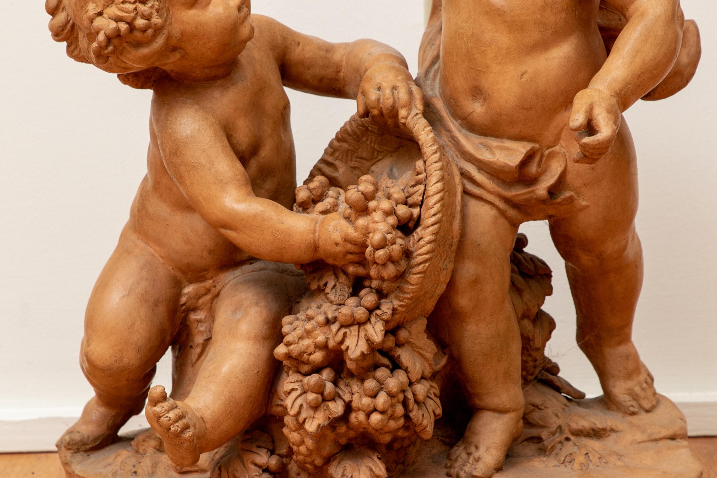 Italian Antique Terracotta Putti Group in the Manner of Clodion
