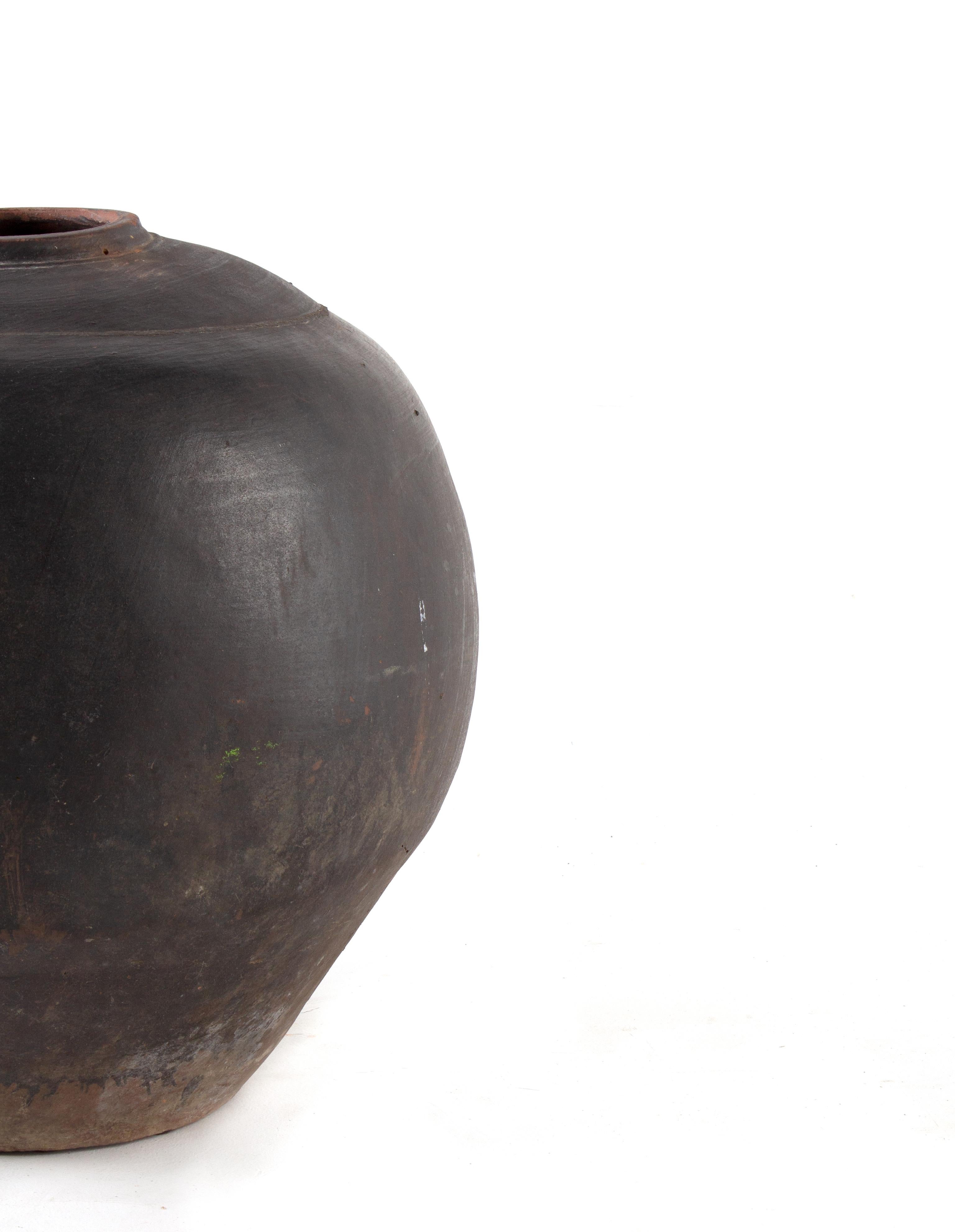 Antique terracotta storage jar.
