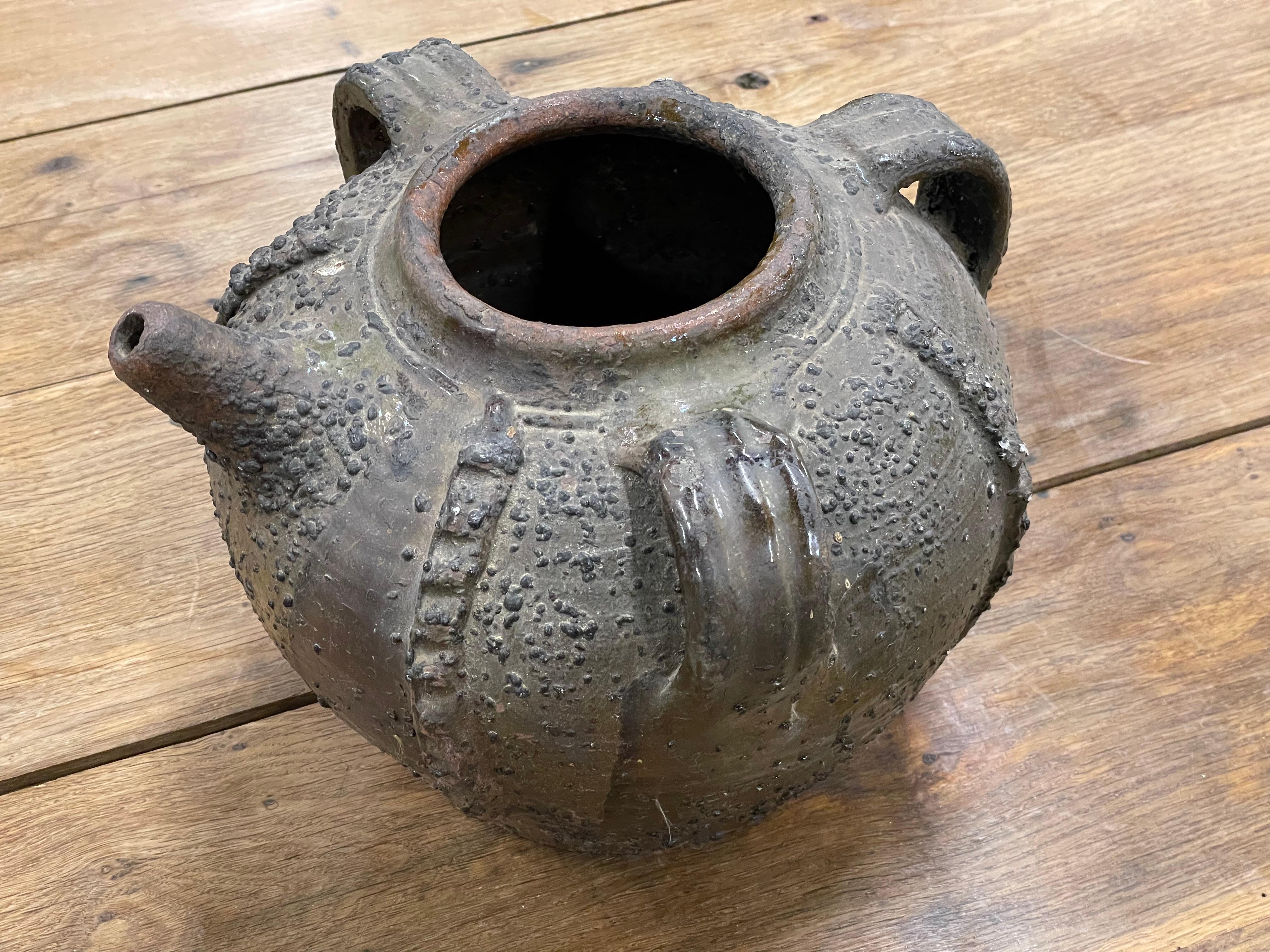 18th Century and Earlier Antique Terracotta Walnut Oil Jug For Sale