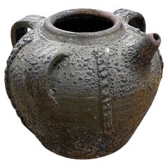 Antiker Terrakotta-Walnuss-Ölkrug