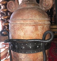 Antique Terracotta Wine Jar with Snake Iron Base