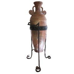 Antique Terracotta Wine Jar with Snake Iron Base
