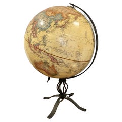 Antique terrestrial globe on a metal stand