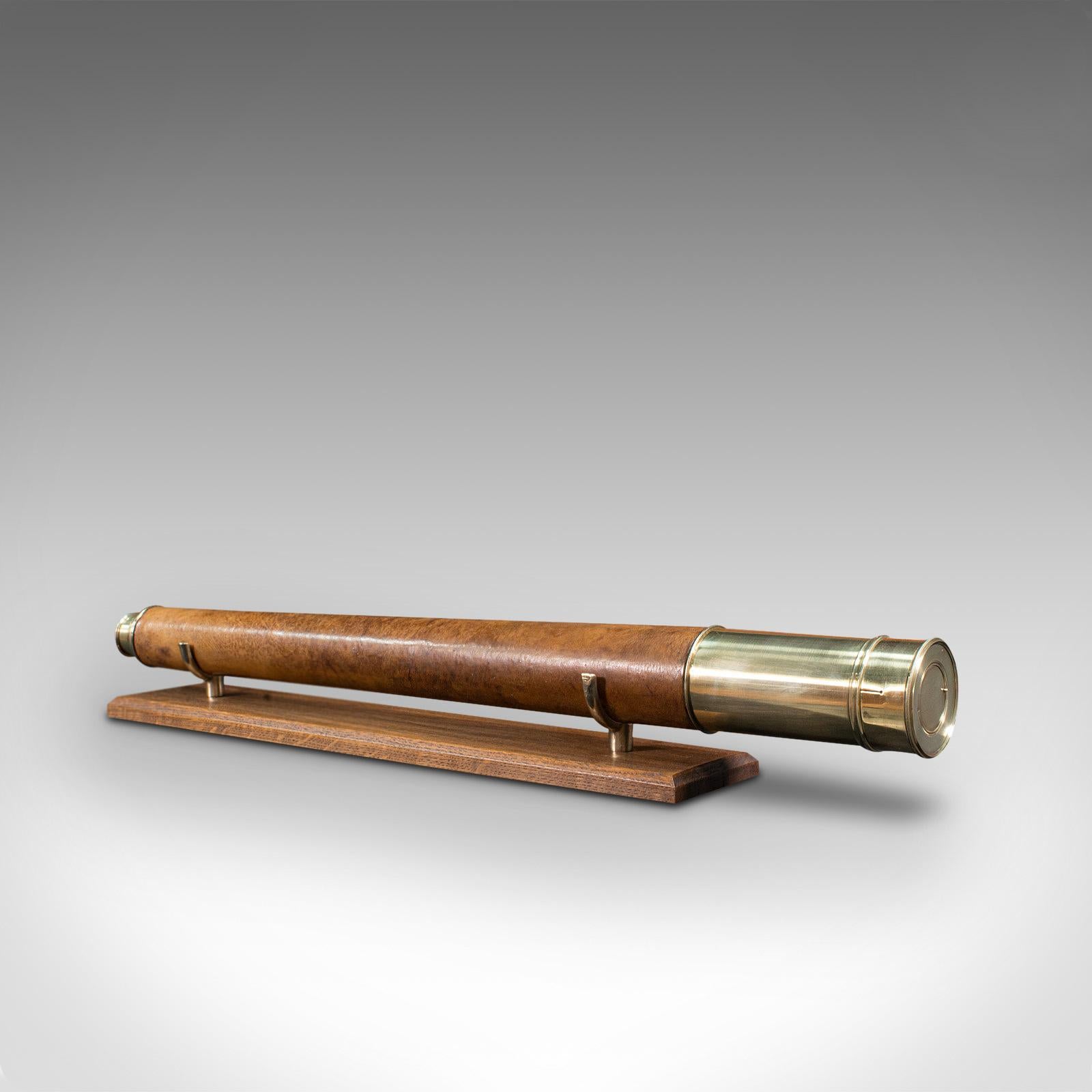 This is an antique terrestrial telescope. An English, single drawer refractor with National Service League mark, dating to the Victorian period, circa 1880.

Perfect for bird watching, landscape appreciation, wildlife, or maritime observation.