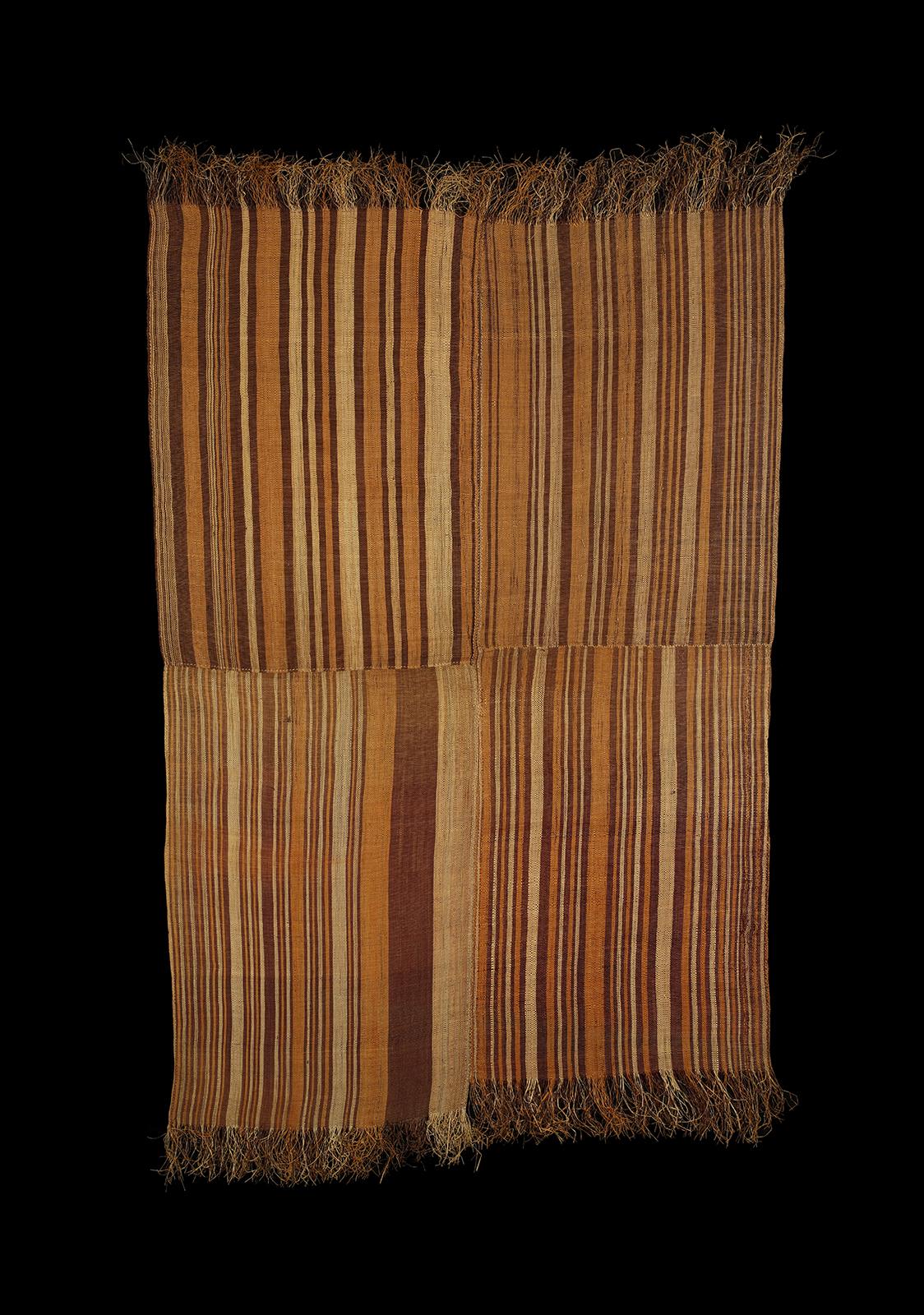 Congolese Textile
Tetela
DR Congo
19th century
Measures: 68 x 41 inches (172 x 104 cm)
Provenance: Ambre-Congo gallery, Brussels
$5,000.

A very rare late 19th century woven raffia textile composed of four separately woven panels, each