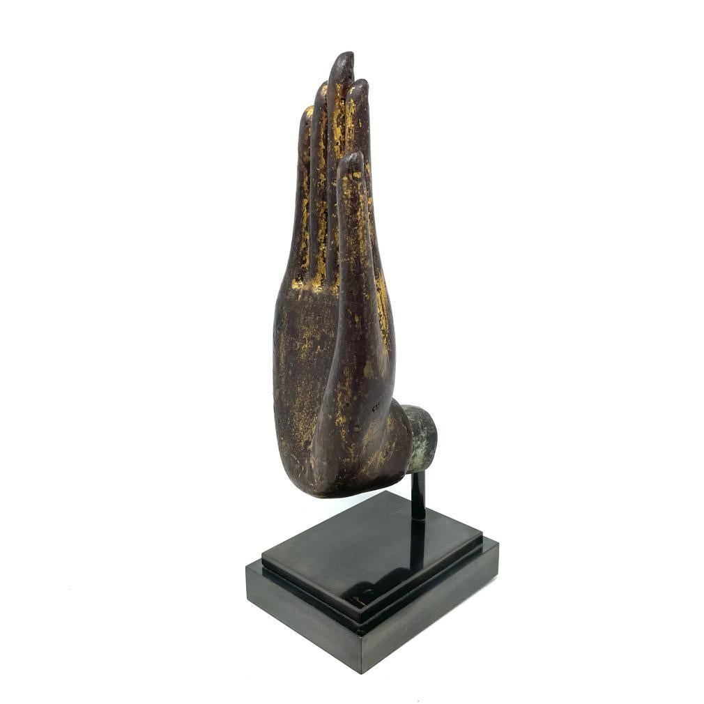 Antique Thai Bronze Hand Fragment, from a life size standing Buddha image in the abhaya mudra, the right hand which is open palm and extended forward in the absence of fear gesture. Elegant slim elongated webbed fingers extended upward  with long