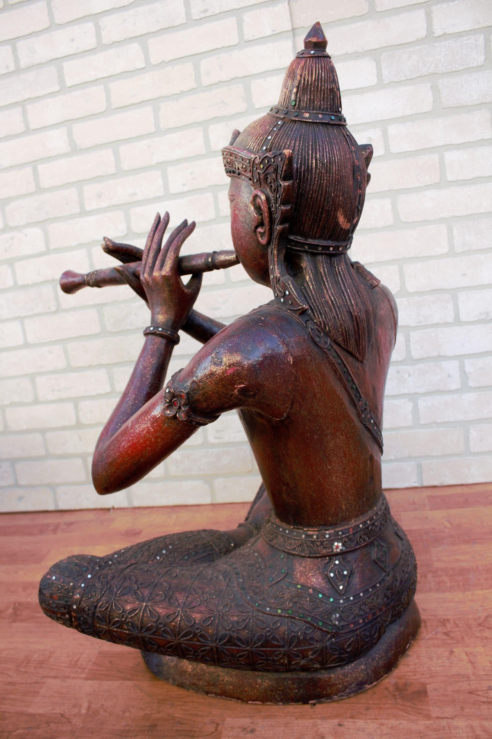 Mirror Antique Thai Carved Seated Buddha Playing a Flute For Sale