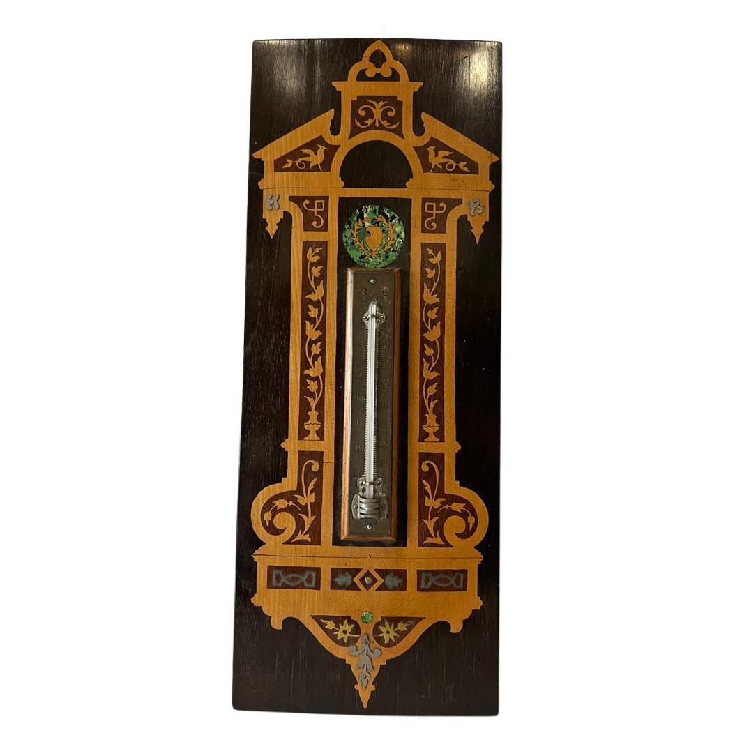 antique thermometer, inlaid with marquetry, Vienna Austria 1907, mahogany, good original condition
On the back is the composition of the materials from the thermometer. 
Signed and dated by the artist.