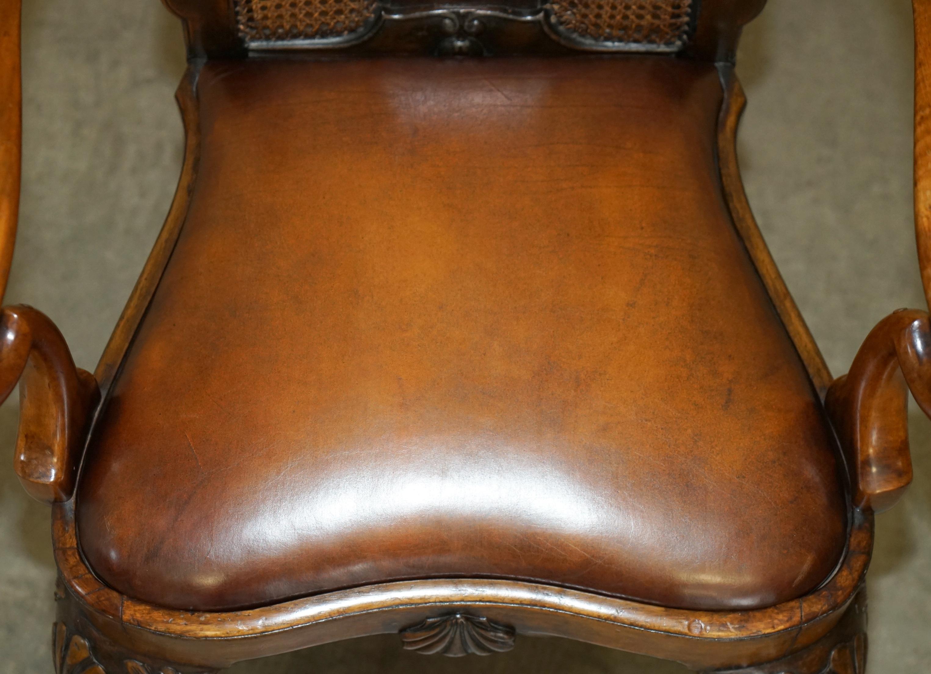 Leather ANTIQUE THOMAS CHIPPENDALE CLAW & BALL CARVED BERGERE BROWN LEATHER ARMCHAiR For Sale