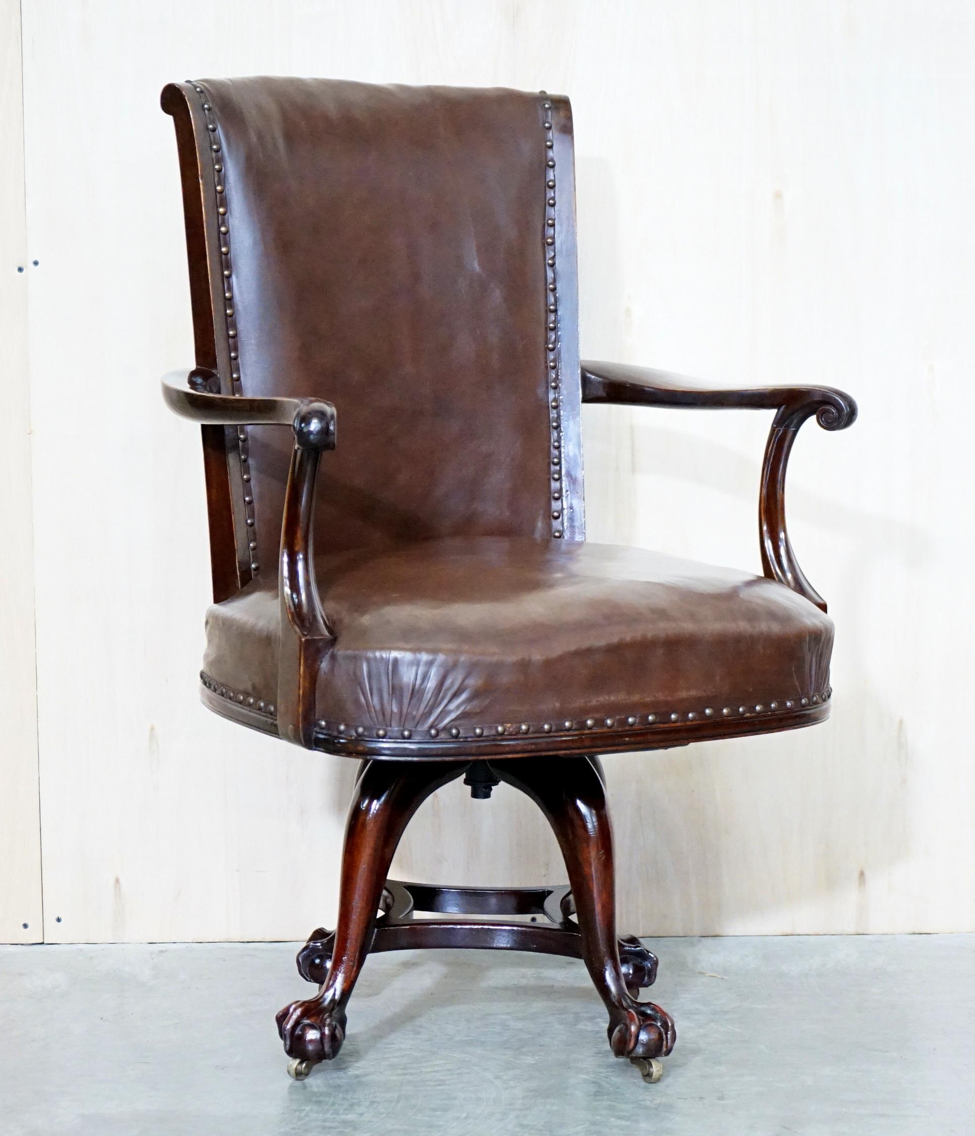 We are delighted to offer this exquisite, highly collectable, Thomas Chippendale Claw & Ball foot, swivel office chair in brown leather

What a chair! This is pure art furniture and looks sublime from every angle. Its larger than normal and as