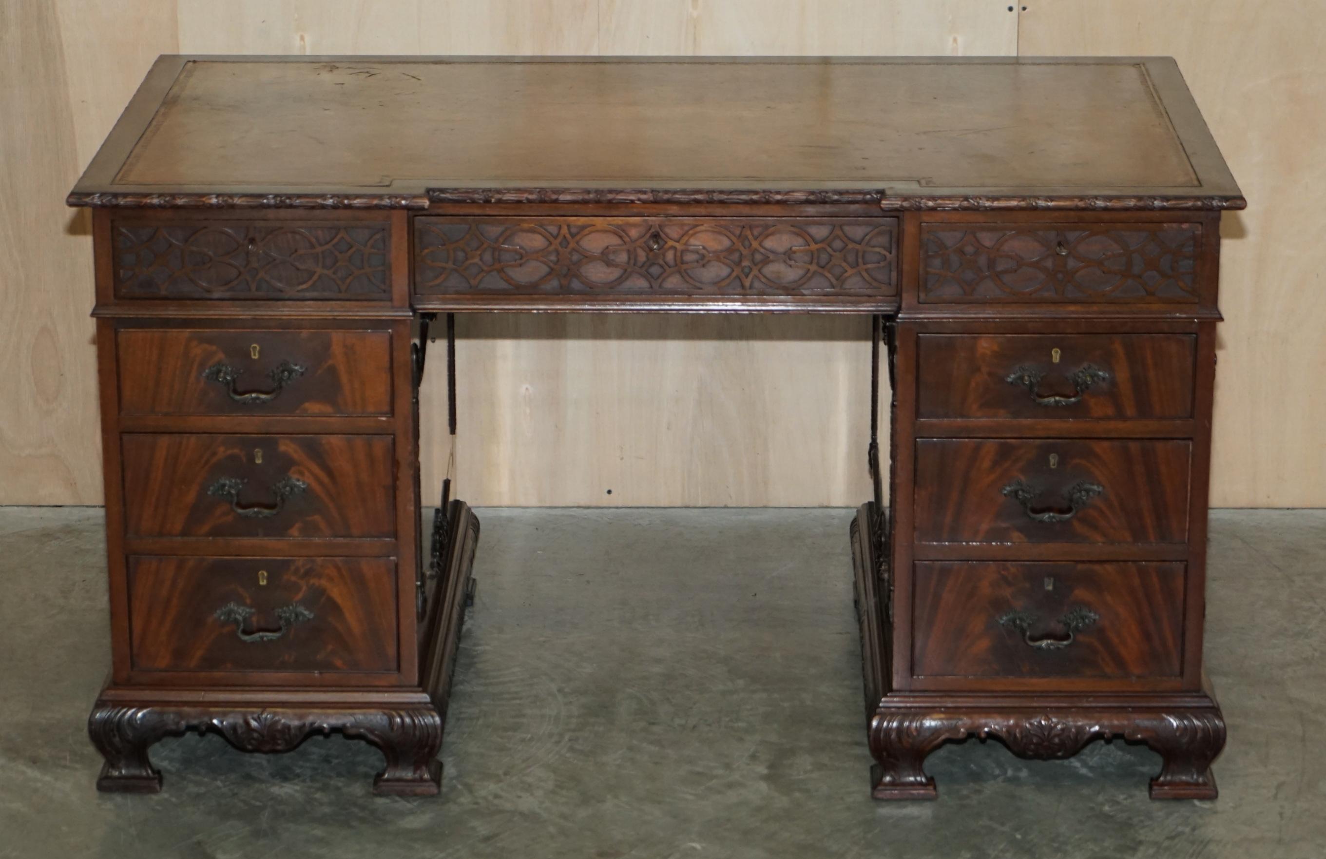 We are delighted to offer this lovely flamed mahogany, Thomas Chippendale Revival twin pedestal, partner desk with Regency brown Leather top and inverted breakfront 

A very good looking and well made desk, it is a copy of an original Thomas