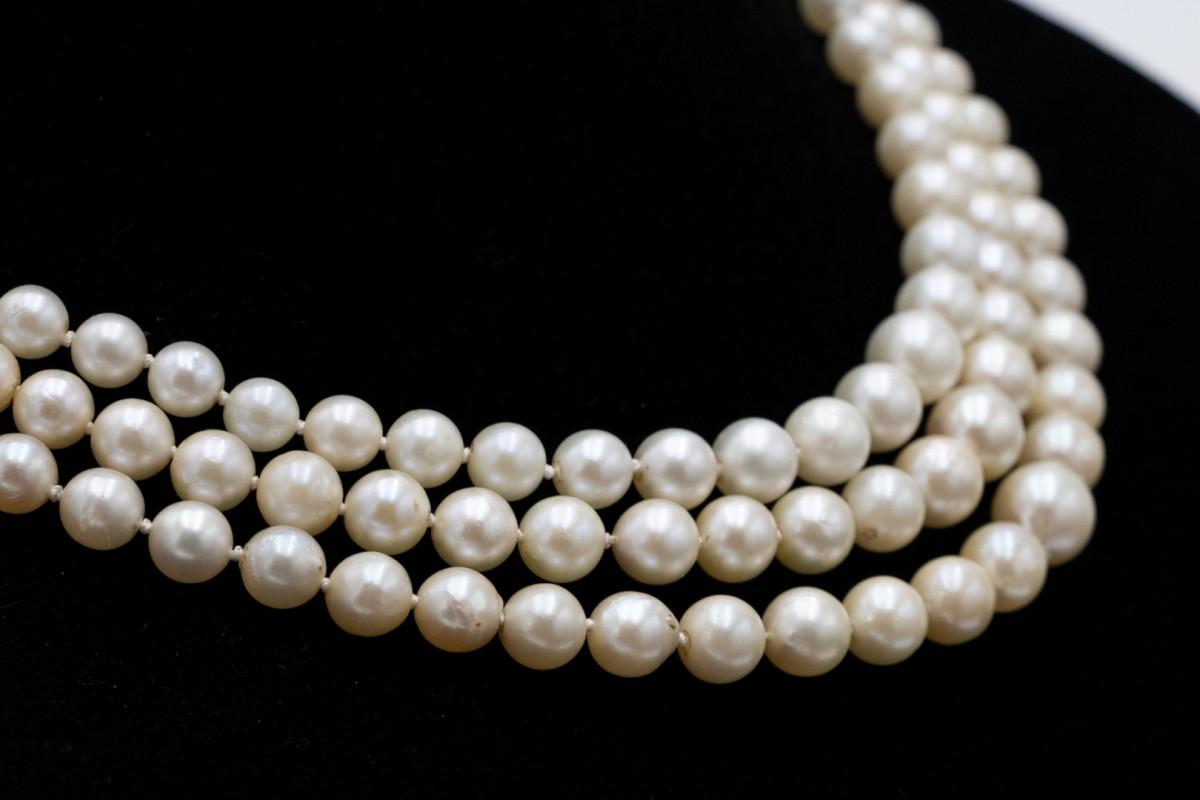 Old European Cut Antique three-row pearl necklace with a platinum clasp and diamonds. For Sale