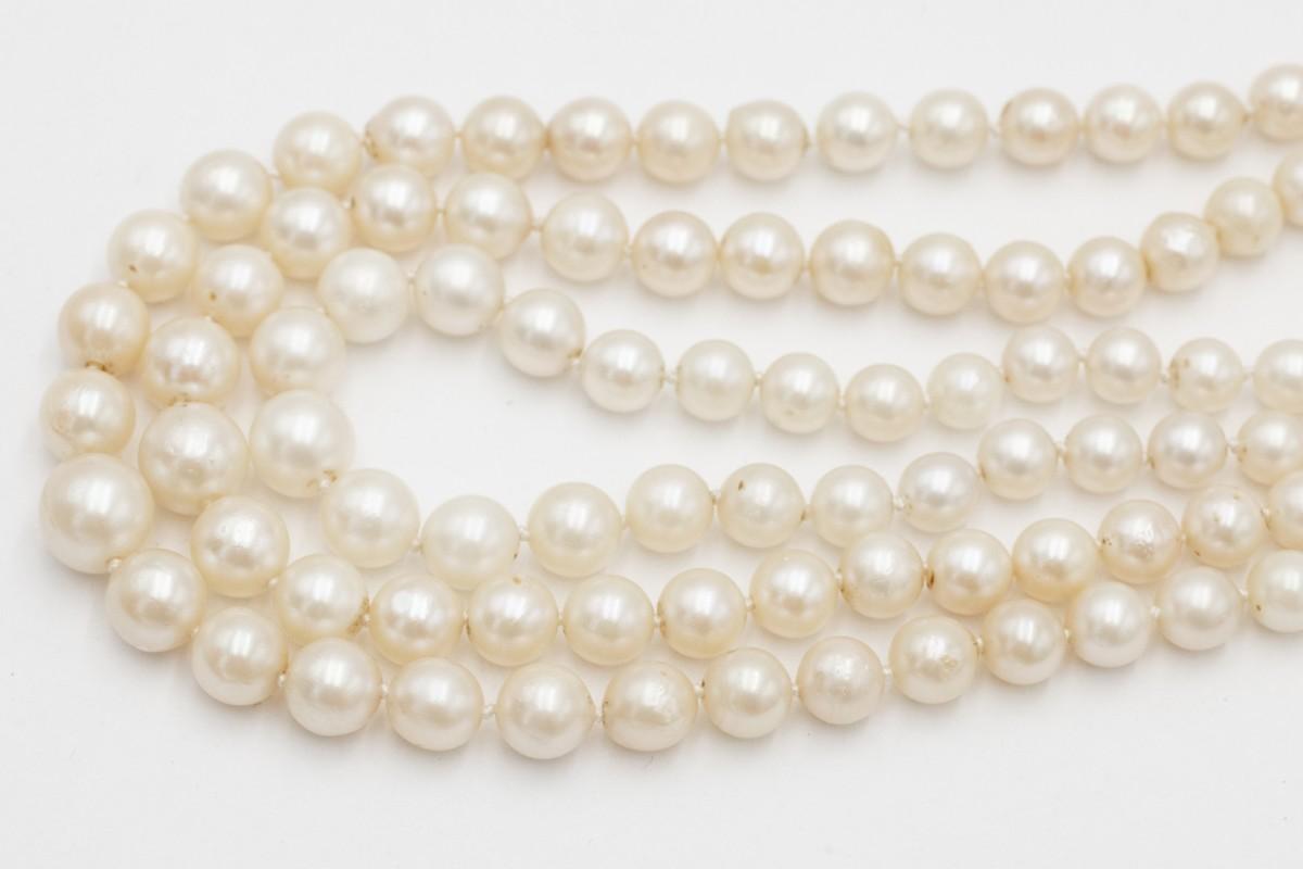 Women's or Men's Antique three-row pearl necklace with a platinum clasp and diamonds. For Sale