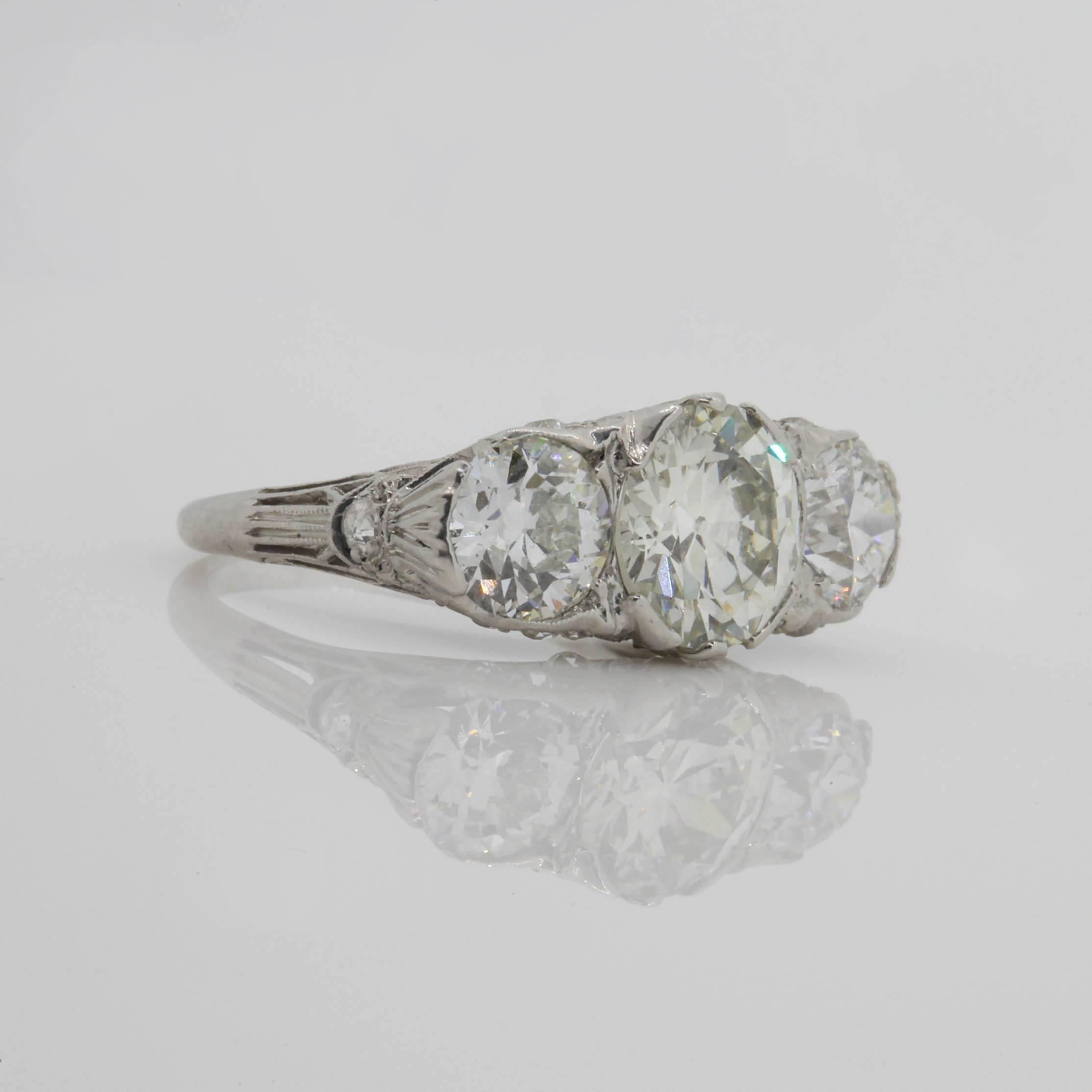 Old European Cut Antique 3.58 Carat Three-Stone Old Cut Diamond Platinum Ring