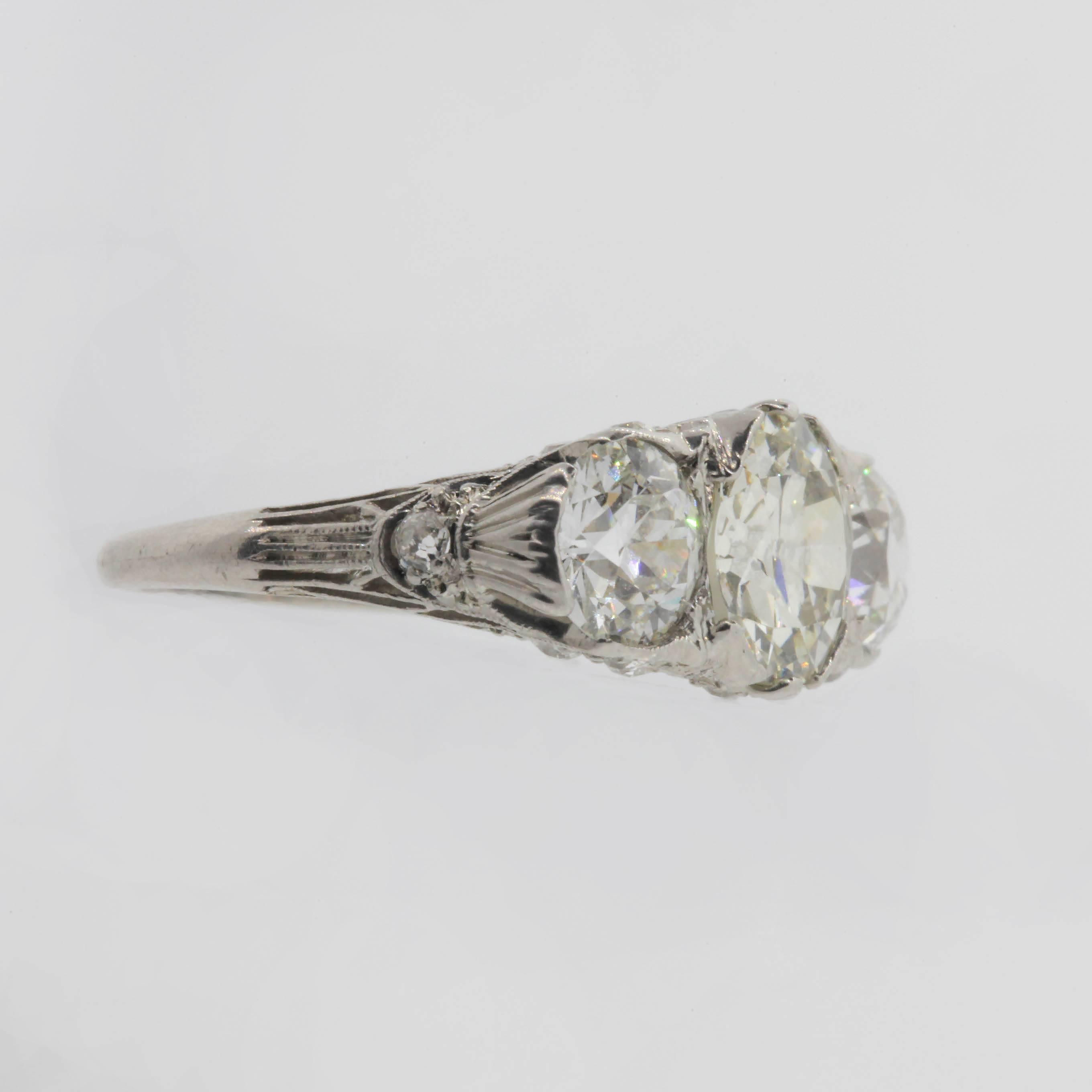 Antique 3.58 Carat Three-Stone Old Cut Diamond Platinum Ring In Excellent Condition In Beverly Hills, CA