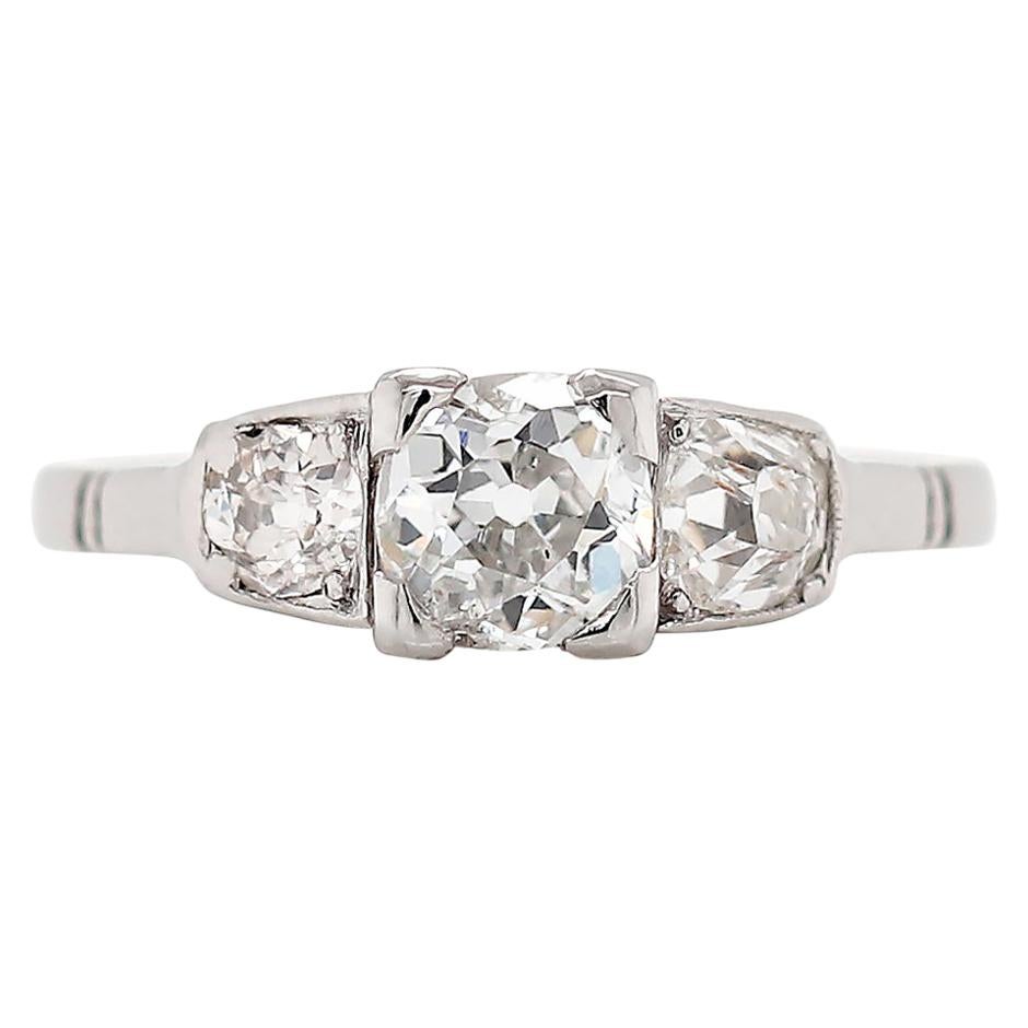 Antique Three-Stone Old Cut Diamond Platinum Engagement Ring, circa 1900s