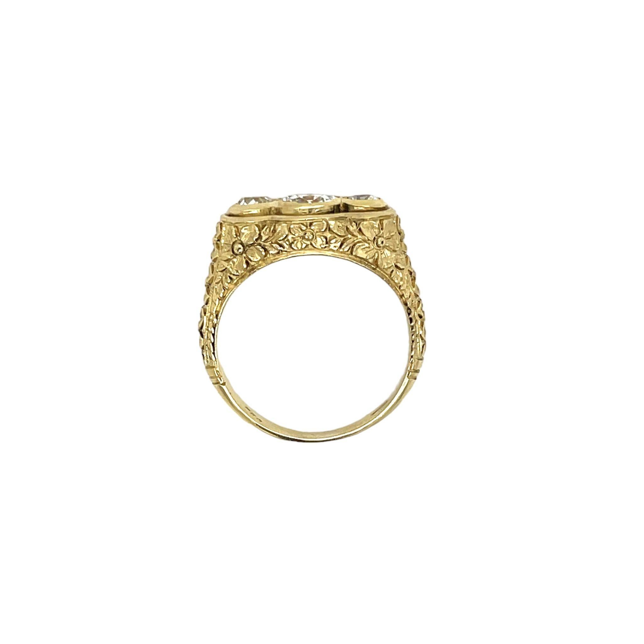 Gorgeous design ring, dated '1900, handcrafted in 18K gold. The Center is embellished with a large sparkling Old mine cut Diamond  weight 0,68 Carat graded H/I Color Si2 clarity, and on the side 2 smaller diamonds  total weight 0.40 carats, same