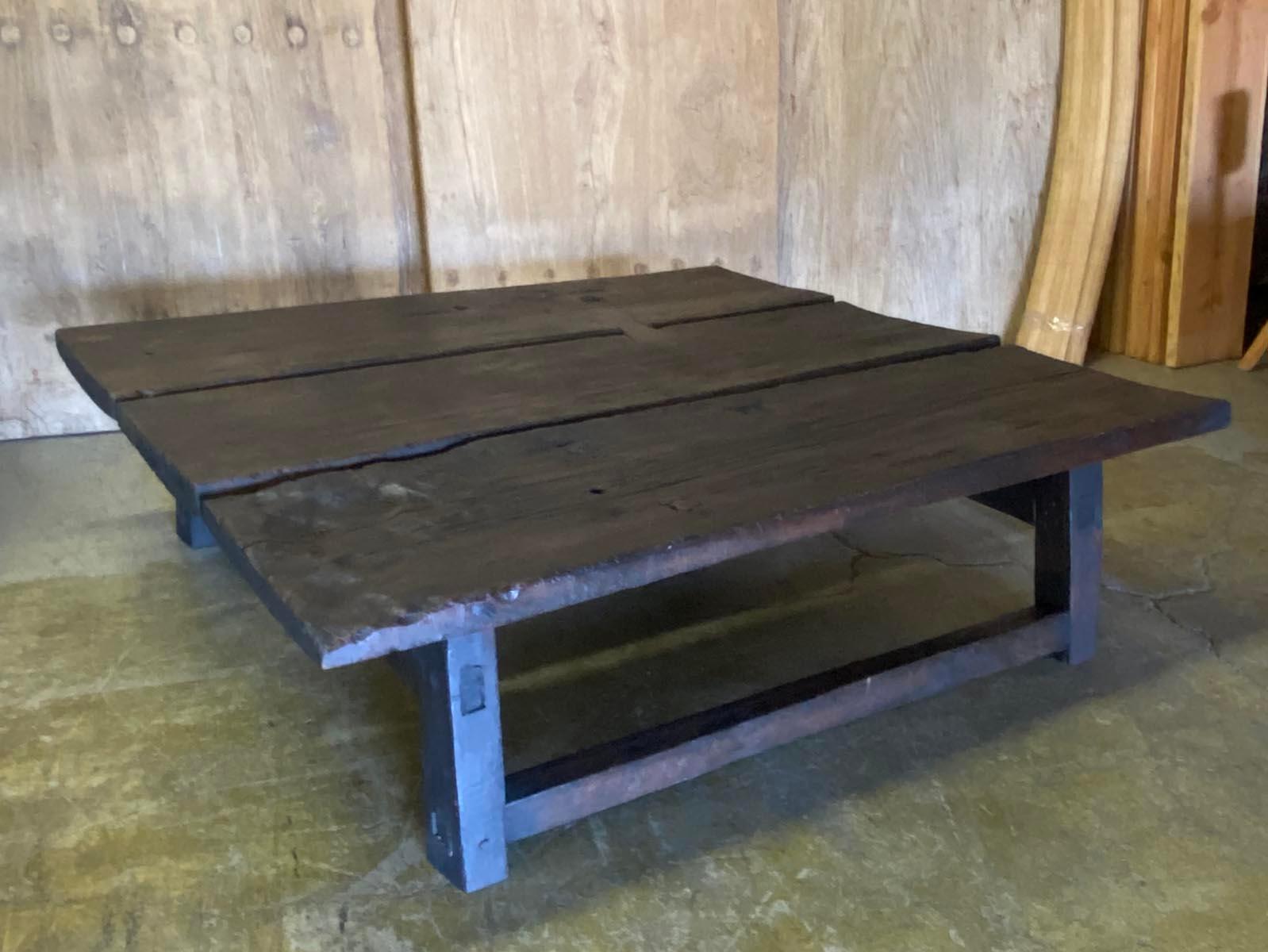 This coffee table was made from a 19th century long, skinny 