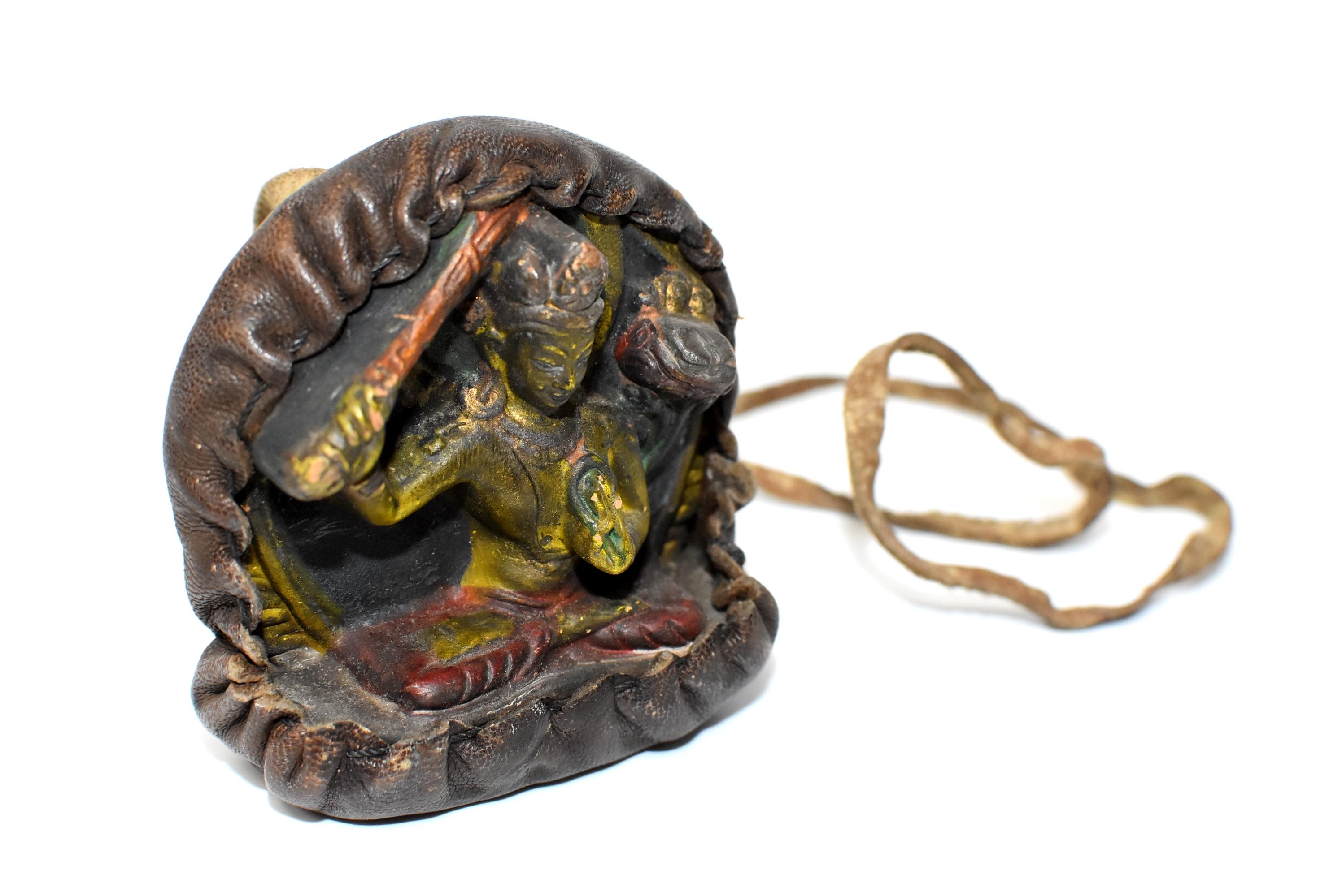 Antique Tibetan Amulet, Leather with Tara Holding Sword In Good Condition In Somis, CA