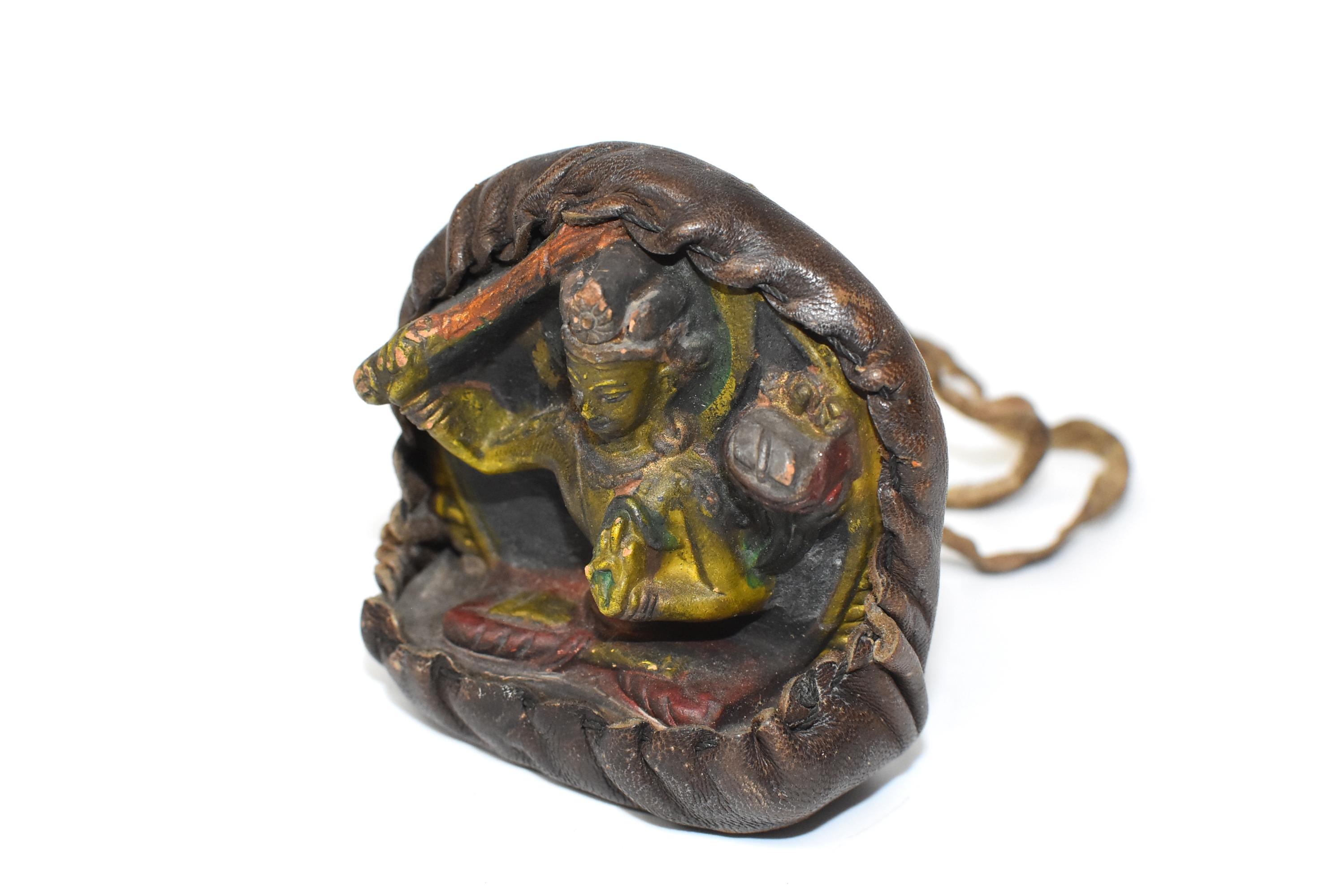20th Century Antique Tibetan Amulet, Leather with Tara Holding Sword