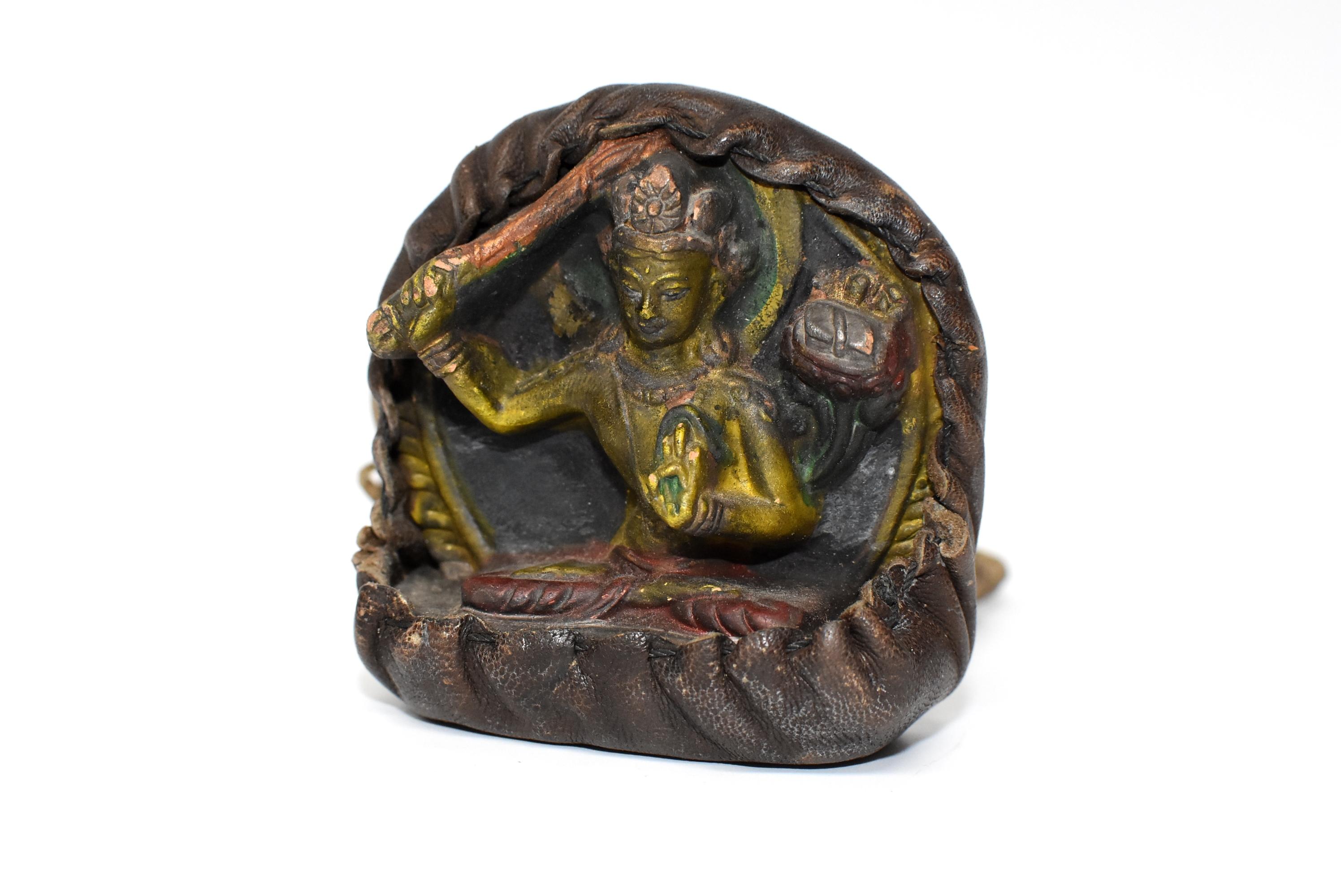 Antique Tibetan Amulet, Leather with Tara Holding Sword 1
