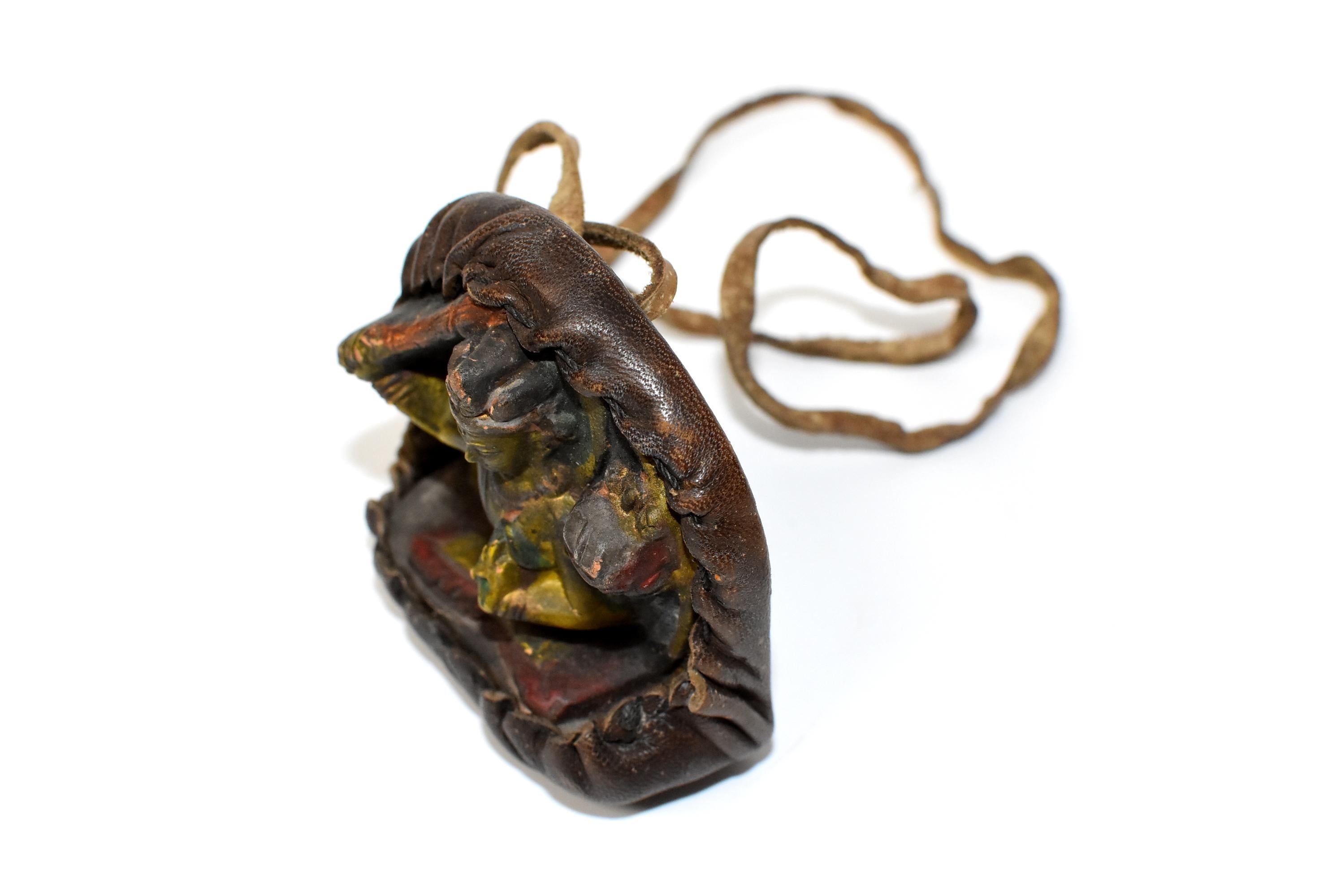 Antique Tibetan Amulet, Leather with Tara Holding Sword 2
