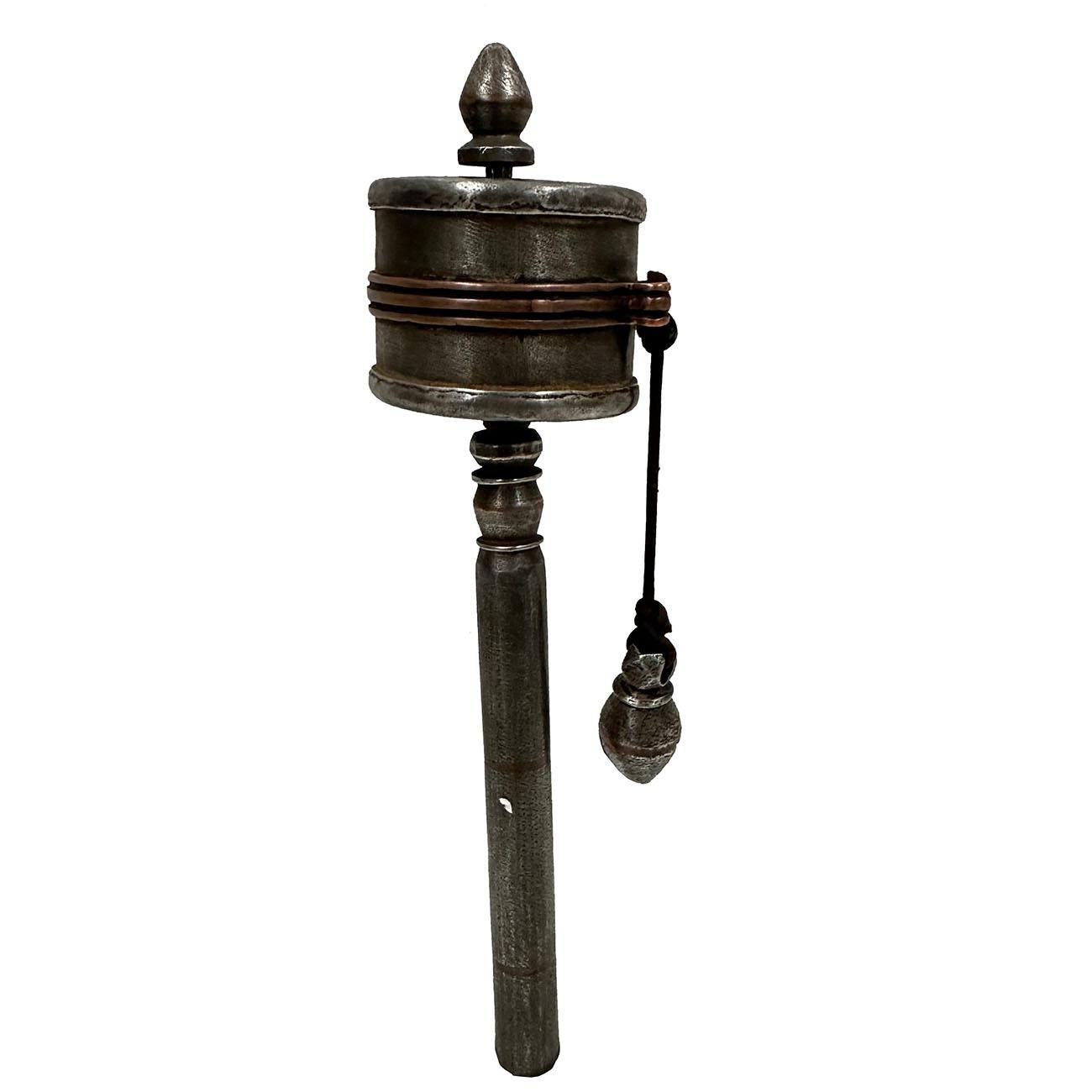 This is handcrafted Tibetan handheld spinning Prayer Wheel. This spinning prayer wheel was made from Sky Iron and has detailed handcrafted Tibetan traditional design with Copper wire inlay. It was used for travel or daily pray. Sky Iron is an item