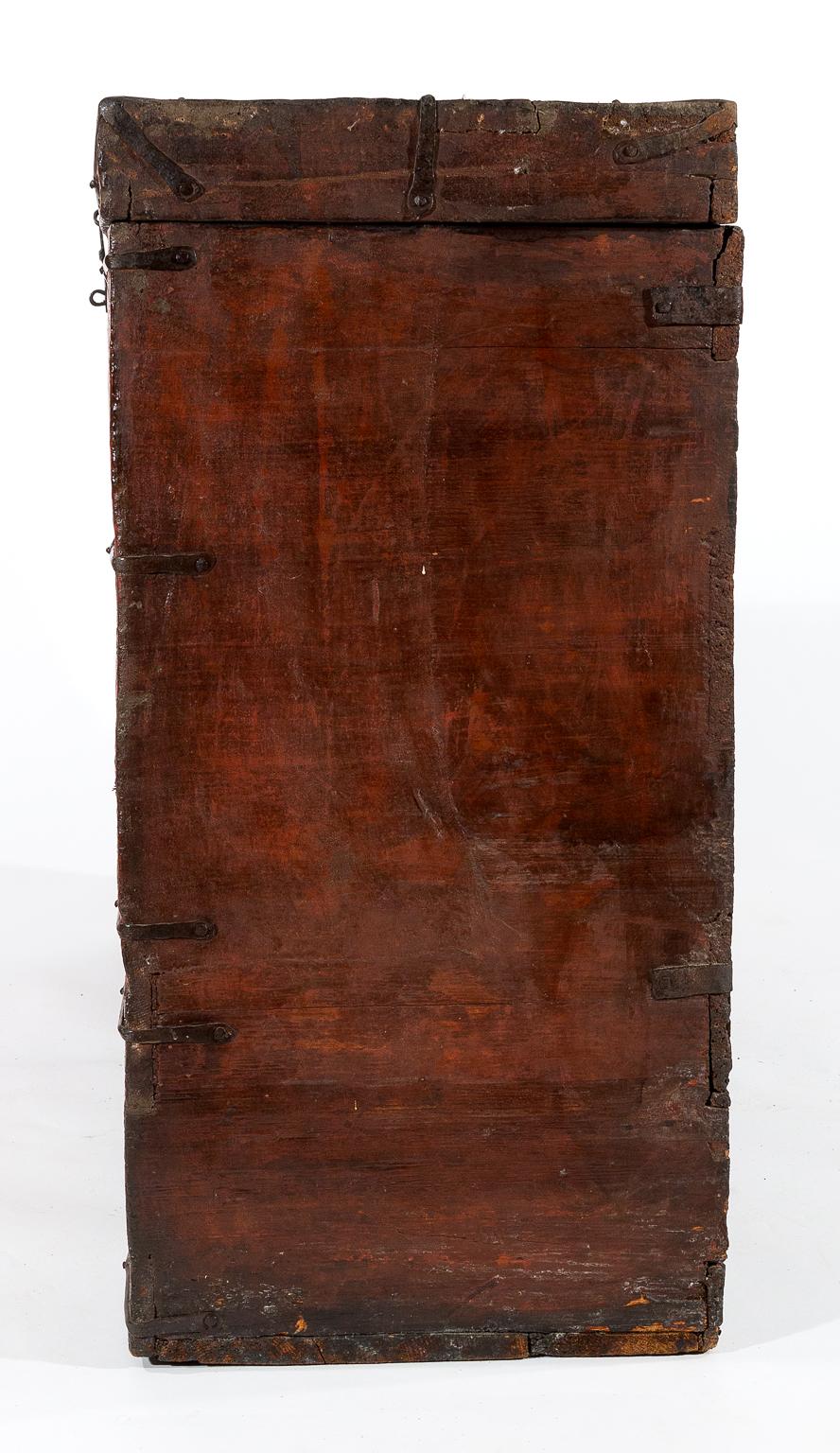 This antique Tibetan chest was made for use in a monastery and would make a wonderful console or side table. Made from hand planed wood with hand forged iron details. What makes it really special and rare is its original paint which was made from