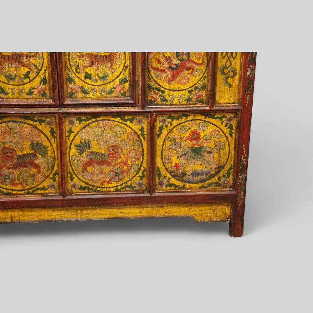 Antique Tibetan decorated cabinet 
This Antique Tibetan decorated cabinet was made in the 19thc century.
It is beautifully hand painted and decorated on the elm carcass.
Furniture of this manner is very desirable as it fits in with both classic and