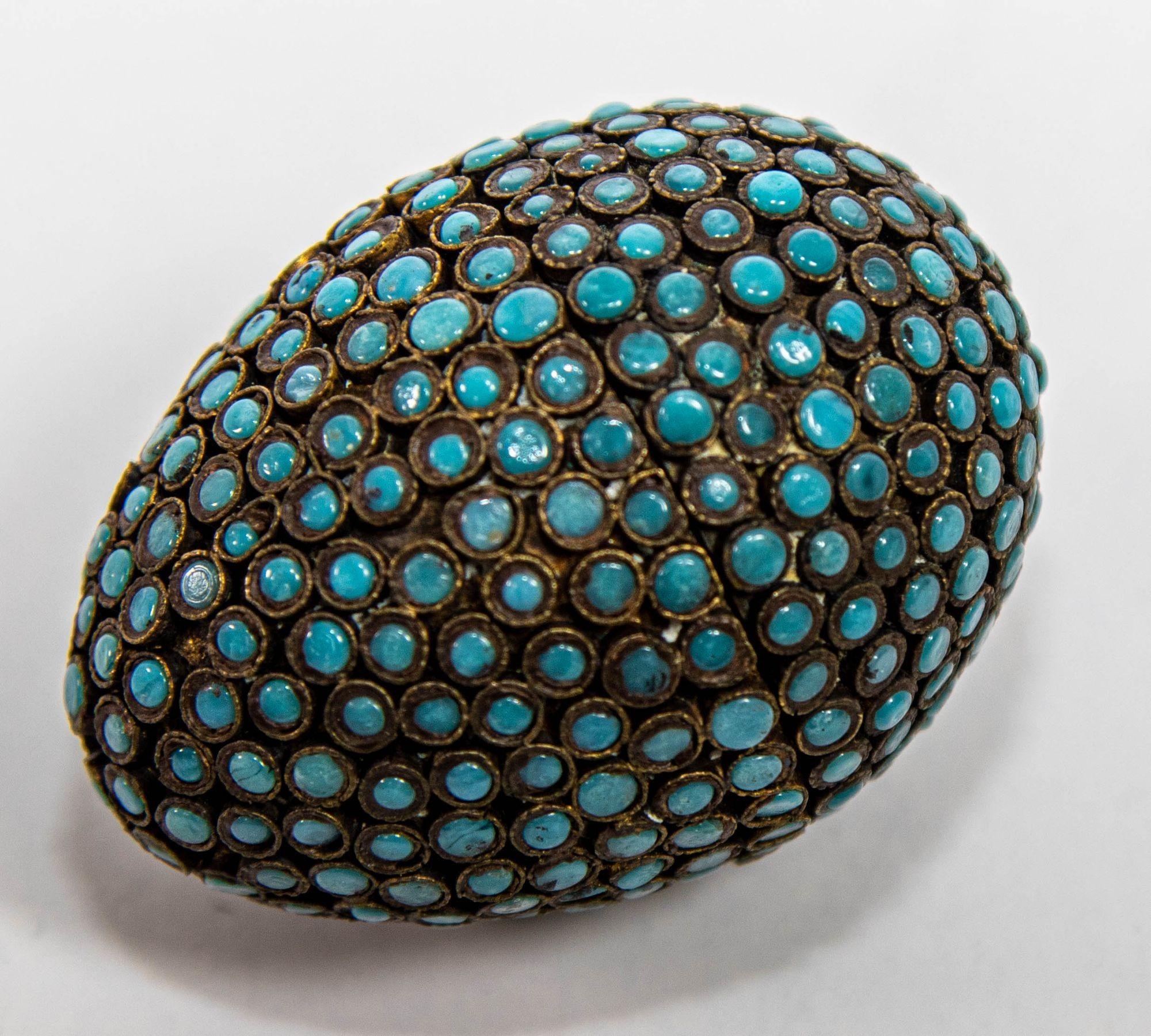 Antique Tibetan Nepal Egg Shaped Box with Gilt Interior and Turquoise Blue Stone Inlay.
Antique Chinese Tibetan brass filigree with turquoise beads egg shaped prayer wish box.
Handcrafted Asian Tibetan, Nepalese brass box inlaid with polished