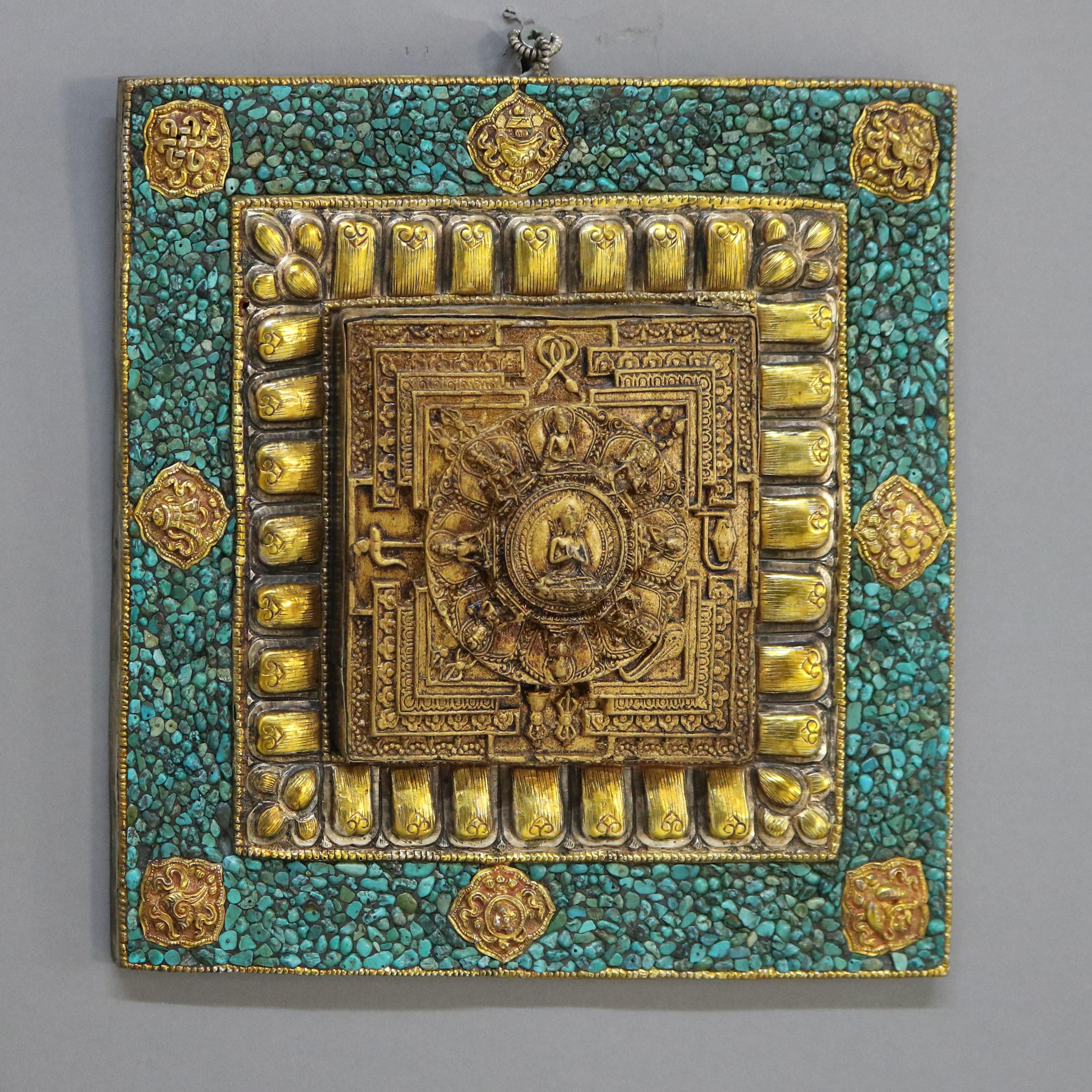 Antique Tibetan Embossed Brass Wall Plaque with Turquoise Inlay C1900.
Measures- 9.75