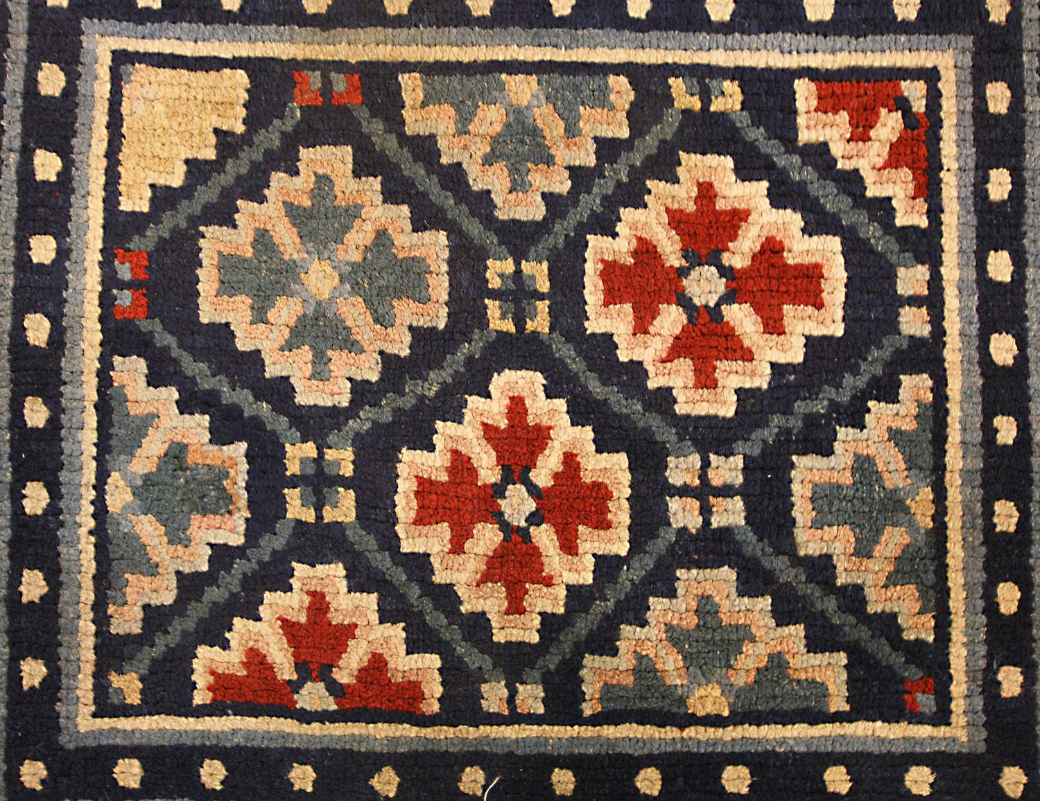 Antique Tibetan Geometric Design Wool Deep Blue Field Rug, ca. 1920 In Good Condition For Sale In Ferrara, IT