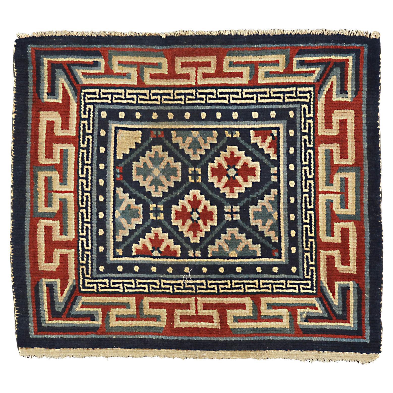 Antique Tibetan Geometric Design Wool Deep Blue Field Rug, ca. 1920