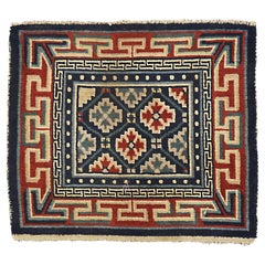 Antique Tibetan Geometric Design Wool Deep Blue Field Rug, ca. 1920