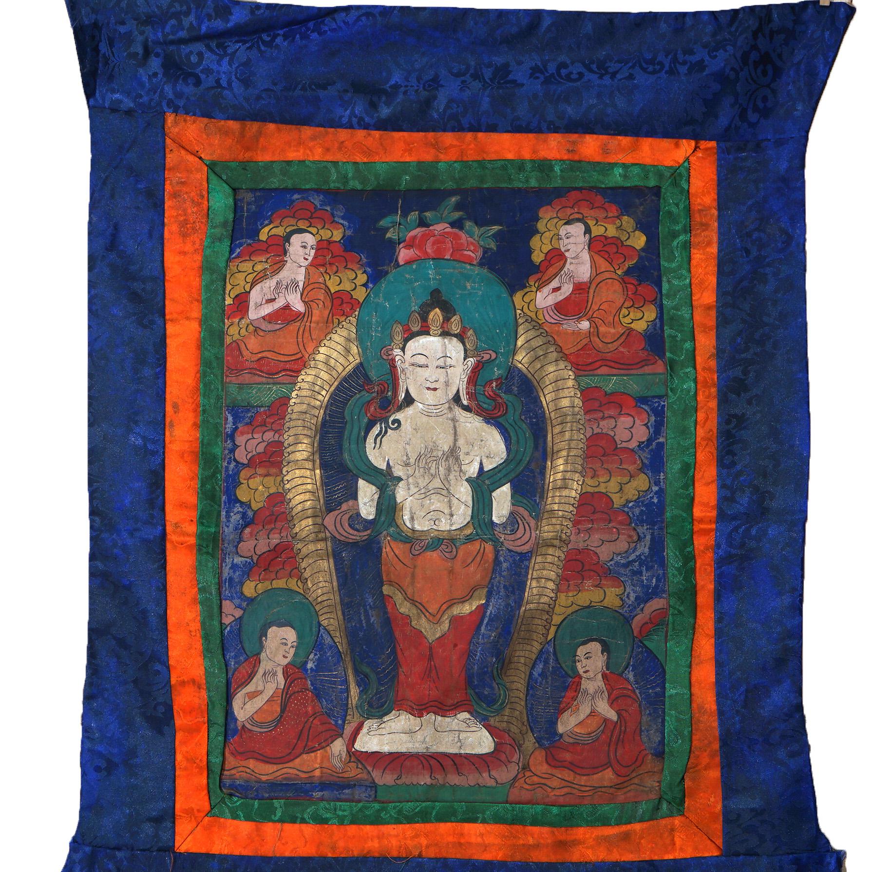 Antique Tibetan Hand Painted Silk and Canvas Thangka with Figures C1920

Measures- 39''H x 34''W x .25''D