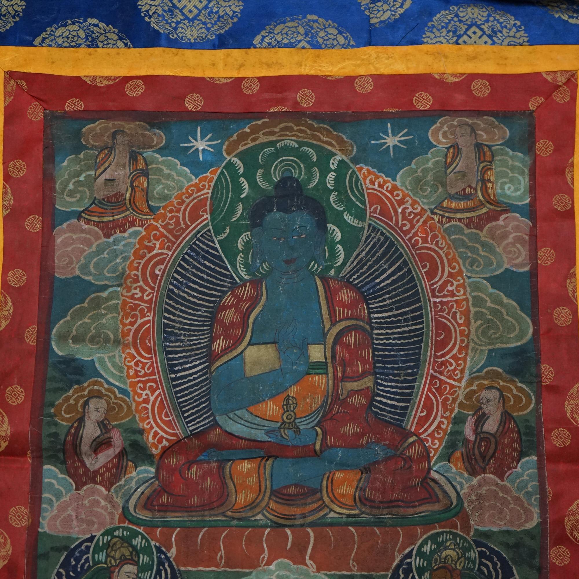 Antique Tibetan Hand Painted Silk and Canvas Thangka with Figures C1920

Measures- 36''H x 30.75''W x .25''D