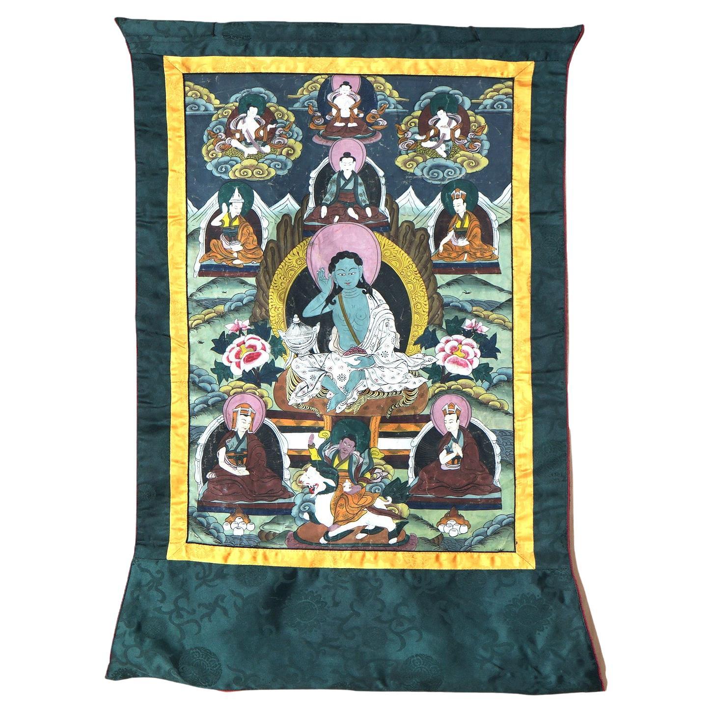 Antike tibetische handbemalte Thangka aus Seide und Leinwand mit Figuren aus Tibet, um 1920 im Angebot