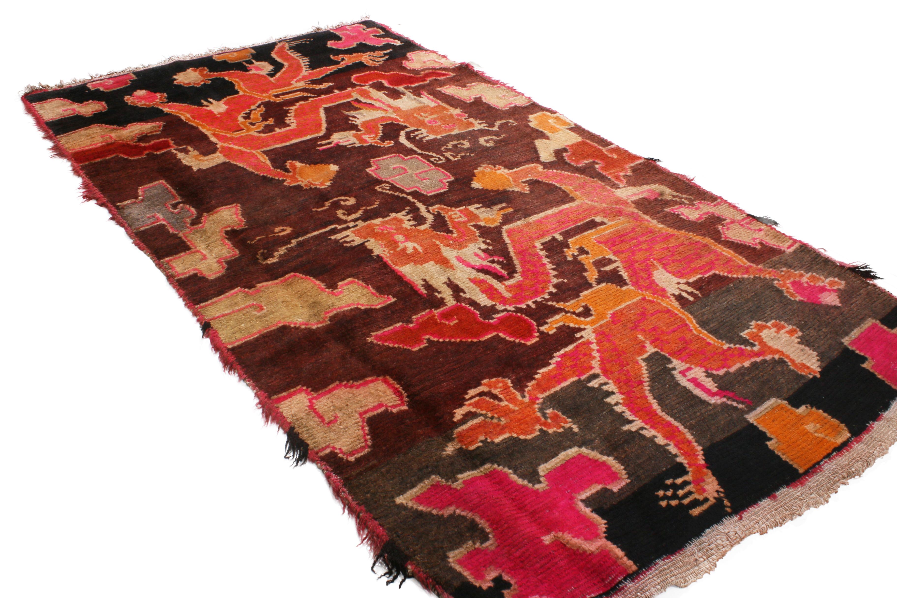 Chinese Antique Tibetan Orange and Brown Wool Rug with Dragon and Cloud Motifs