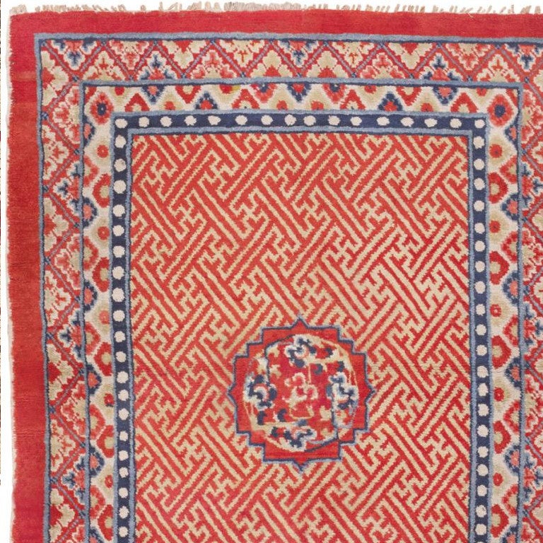 Chinese Export Antique Tibetan Rug. Size: 4 ft 2 in x 5 ft 8 in (1.27 m x 1.73 m)