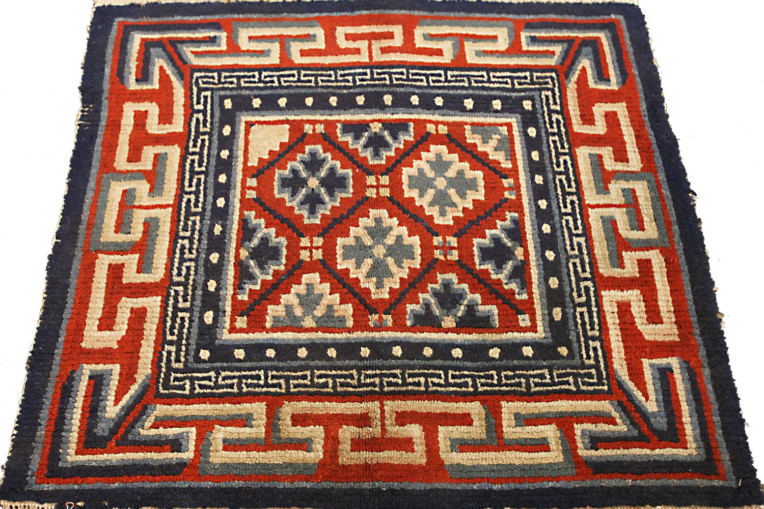 Hand-Knotted Antique Tibetan Rug Snowflakes Design with Medallion Multi-Color, 1900-1920 For Sale