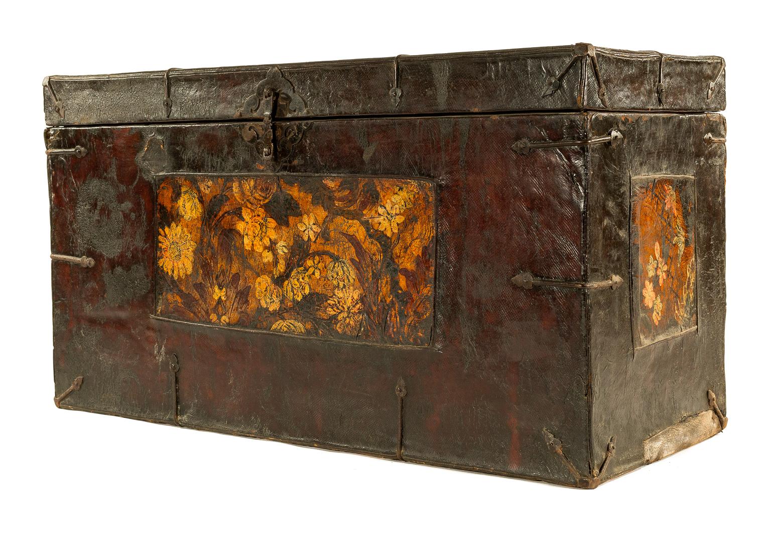 Its a handmade wood chest and it is covered with stretched leather with some paint and also hand forged ironwork details. A chest of this type would have only been owned by a wealthy noble family in Tibet. The chest could be between 150-250 years