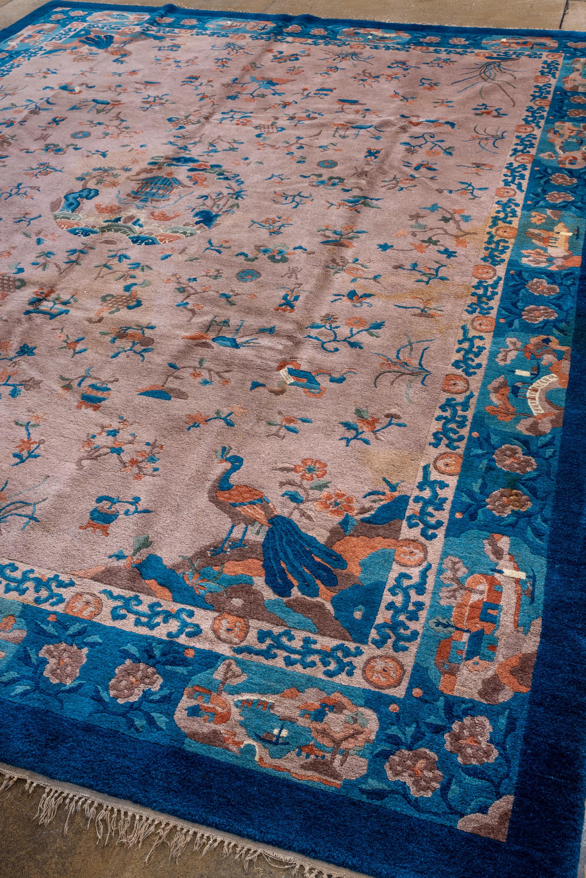 Hand-Knotted Antique Tientsin Chinese Rug with Tan Field and Allover Chinese Motives For Sale
